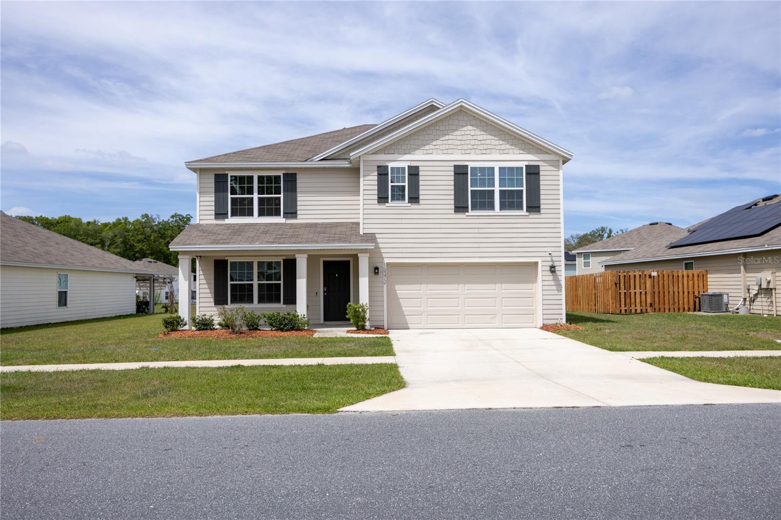 This spacious 5-bedroom, 3-bathroom home with a versatile bonus room offers the perfect blend of comfort, style, and functionality. Whether you need a home office, flex space, gym, or playroom, this layout adapts to your lifestyle with ease.  Step inside and you’ll immediately appreciate the open and inviting design, ideal for both everyday living and entertaining. The kitchen is a standout feature, complete with sleek granite countertops and all stainless steel appliances, giving you a modern, polished space to cook and gather.  The large primary suite provides a true retreat, offering ample space to relax and unwind after a long day. With multiple additional bedrooms and bathrooms, there’s plenty of room for family, guests, or multi-generational living.  Out back, enjoy one of the home’s most desirable features, it backs up to a peaceful common green space, creating extra privacy, beautiful views, and a sense of openness with no rear neighbors.  Conveniently located just minutes from downtown High Springs and a short drive to Gainesville, you’ll have quick access to shopping, dining, and major conveniences while still enjoying a quiet, laid-back setting.  Outdoor enthusiasts will love being near some of North Florida’s most popular destinations like Ginnie Springs and Ichetucknee Springs State Park, perfect for weekend getaways and year round recreation.  This home truly checks all the boxes. Space, upgrades, privacy, and location.  Schedule your private showing today and come experience the lifestyle this home has for you!