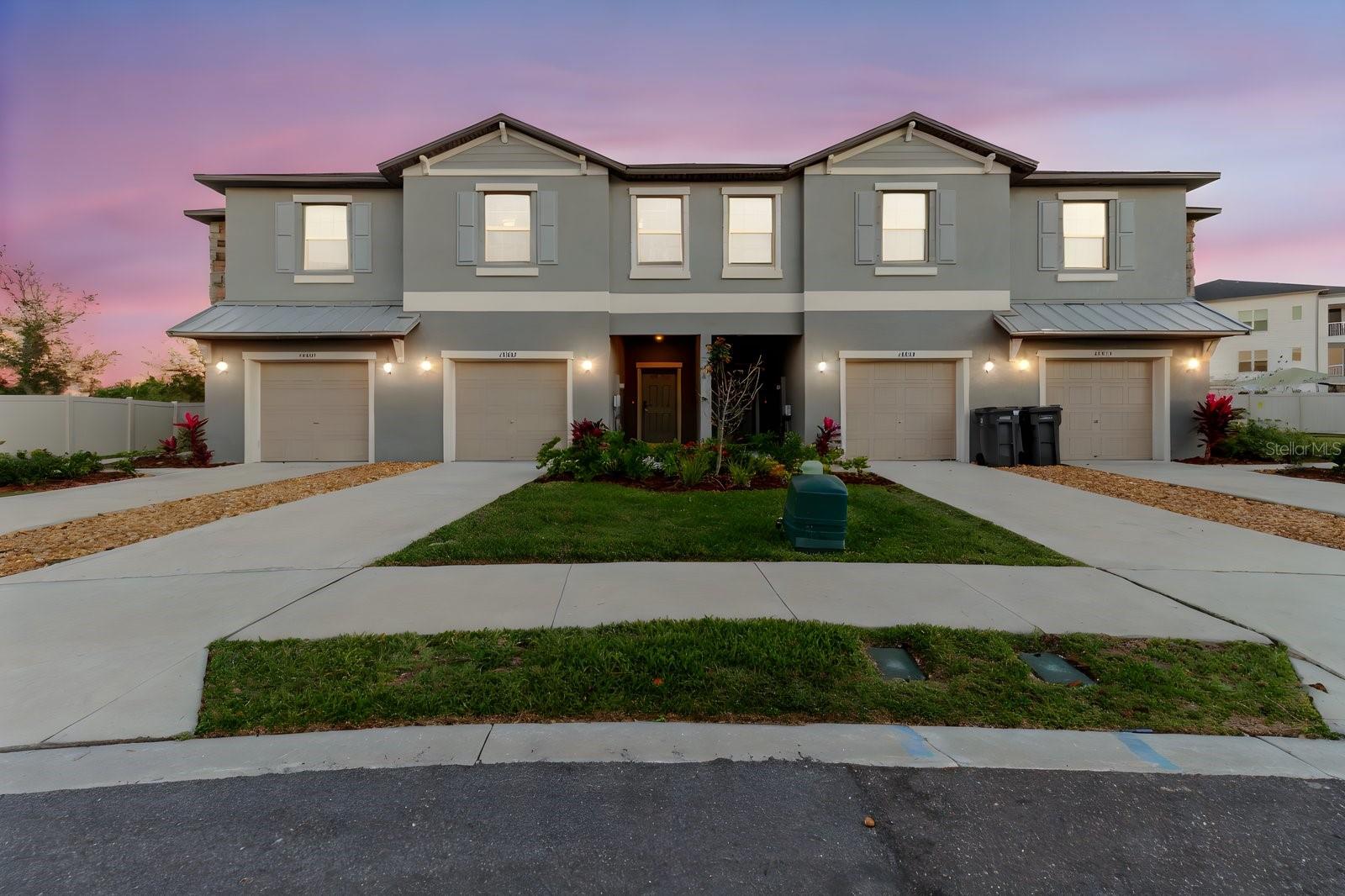 Welcome to Townhomes at Belmont, where modern comfort meets convenience in a secure, gated community. Built in 2023, this beautifully maintained townhome offers 1,701 square feet of thoughtfully designed living space with 3 bedrooms, 2.5 bathrooms, and a versatile loft area perfect for a home office, media room, or additional living space.

The open-concept first floor features ceramic tile flooring throughout and seamlessly connects the living, dining, and kitchen areas, creating an ideal setting for everyday living and entertaining. The stylish kitchen boasts stainless steel appliances, ample cabinetry, generous counter space, and a breakfast bar for casual dining. A convenient half bath is also located on the main level.

Upstairs, the spacious primary suite offers a large walk-in closet and a private en-suite bathroom complete with dual vanities, a walk-in shower, private water closet, and linen closet. Two additional bedrooms share a full bathroom, while the second-floor laundry room includes a washer and dryer for added convenience.

Enjoy outdoor relaxation on the covered lanai and the convenience of an attached one-car garage. All major appliances are included, including refrigerator, range, microwave, dishwasher, washer, and dryer. Water service is included through the HOA.

Residents of Belmont enjoy access to resort-style community amenities, including a swimming pool, playgrounds, parks, and scenic walking trails. Ideally located just minutes from US-301 and I-75, this home provides easy access to Tampa, Brandon, shopping, dining, entertainment, and top-rated schools.

Don't miss this opportunity to lease a nearly new townhome in one of the area's most desirable master-planned communities.