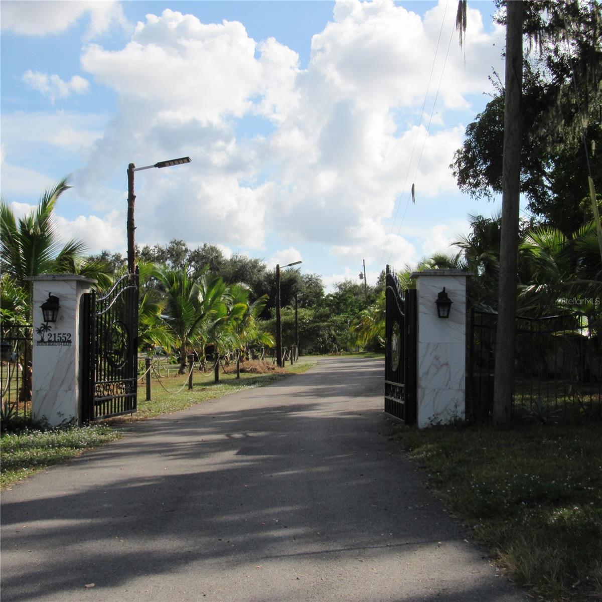 A 16 acre mixed-zoning land is available for sale on SR 64 in Bradenton, just across from Manatee Lake. The property currently operate as a tour destination and active tropical fruit ranch, offering exotic fruits, foods and drinks to visitors. This ranch, known for its lush variety of mangoes, sugar apples and more, also hosts private tours, events and orchard dinners, presenting an engaging, income-generating opportunity for buyers.
Lakewood Ranch is nearby, one of the fastest growing master-planned communities in the U.S., underlining the high investment potential for this property. Serious investors and interested parties are encouraged to call today to schedule a private tour and explore the endless opportunities.