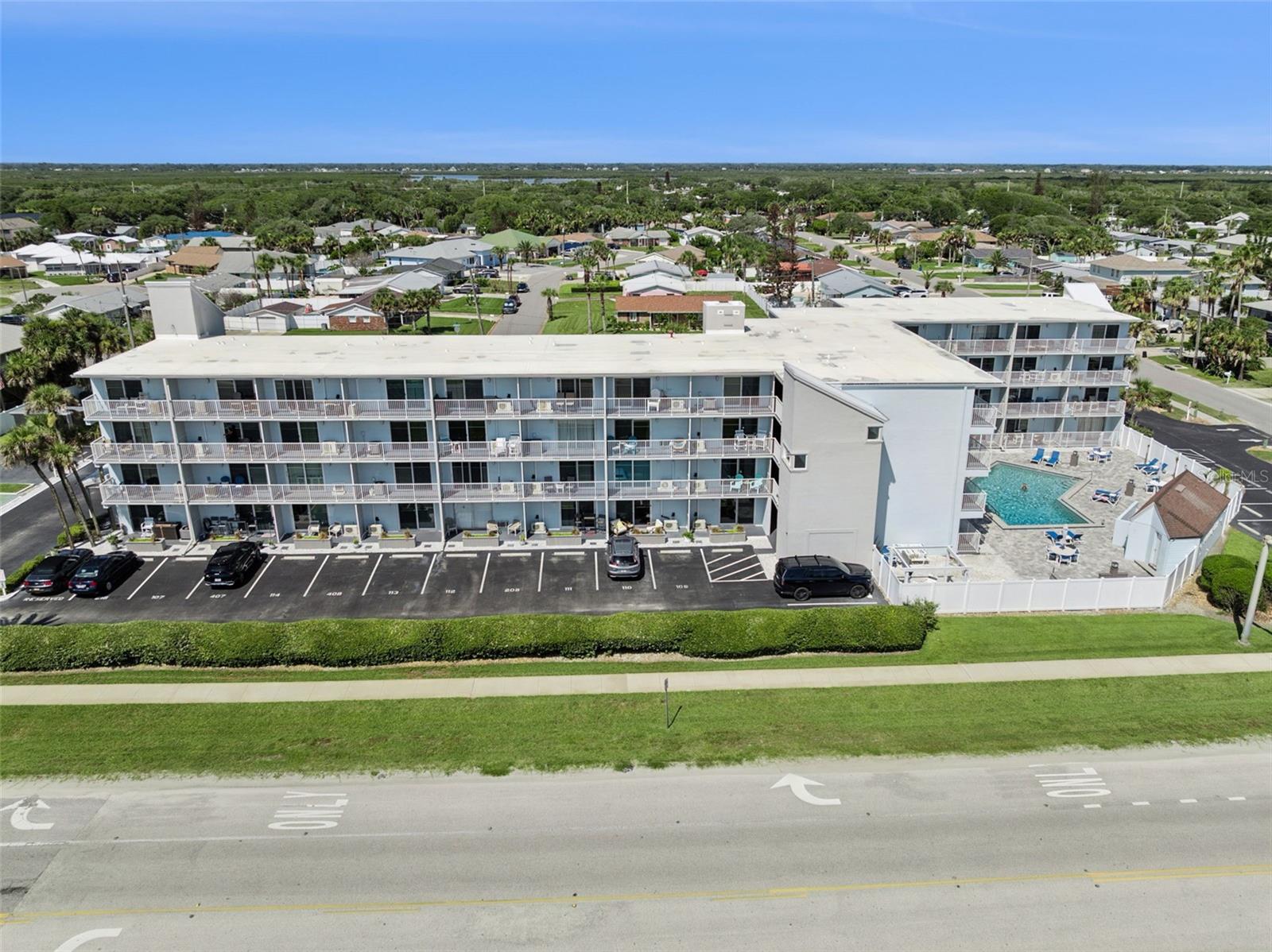 Location, Location, Location! LOOK AT THE VIEW!  Enjoy coastal living at its best in this beautifully furnished and tastefully decorated condo, ideally located directly across the street from the beach. Wake up to stunning ocean views! Currently an active short-term rental with 5 Stars and future bookings, this freshly updated (2023), turnkey property comes fully furnished and is ready as a second home or immediate income. Residents and guests enjoy a variety of community amenities, including a sparkling swimming pool with convenient bathroom facilities, the Sun Plaza featuring a BBQ grill and outdoor seating, a car wash station, community washers and dryers, a secure mail room, shared storage space, and dedicated bike storage. The condo also includes an assigned parking space along with additional guest parking, making it easy to accommodate visitors. A/C 2023, Slider/Front Door/Screen Door 2023, Interior Updates 2023, Furniture and Appliances 2023.