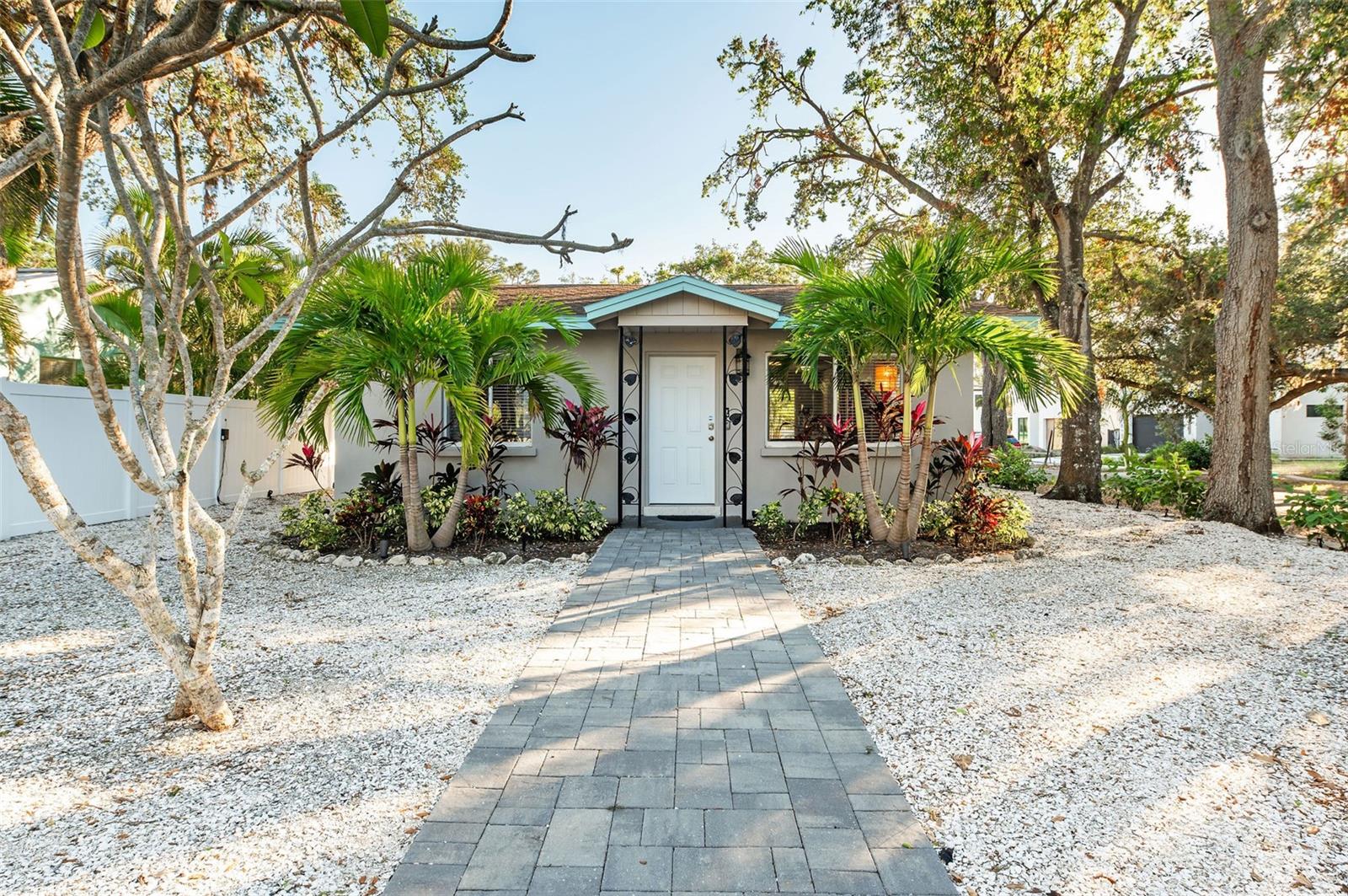 Welcome to your perfect coastal escape—an inviting cottage offering charm, comfort, and an ideal location away from the hustle and bustle of city life. Just a few miles from Siesta Key Beach, you’re only a short bike or golf cart ride from the world-famous quartz sand shores.
This beautifully renovated two-bedroom, one-bath home has been thoughtfully updated from top to bottom. Inside, you’ll find a warm and welcoming layout, while outside, a spacious screened lanai provides the perfect spot to relax and unwind. There’s also ample outdoor space designed for easy Florida living.
Located on Wisconsin Lane just off the north Siesta Key Bridge, this property offers convenient access to the shops and restaurants of Southside Village, placing dining, entertainment, and everyday essentials within easy reach.
Whether you’re searching for a serene winter retreat, a smart investment opportunity, or a comfortable in-law residence in a safe and highly desirable neighborhood, this prime location checks all the boxes. After a long day at the beach, come home to your private haven and relax in style.The low-maintenance landscape design features elegant stone and shell accents, complemented by irrigation and ambient landscape lighting throughout the property.
Don’t miss your opportunity to own this exceptional cottage—schedule your private showing today!