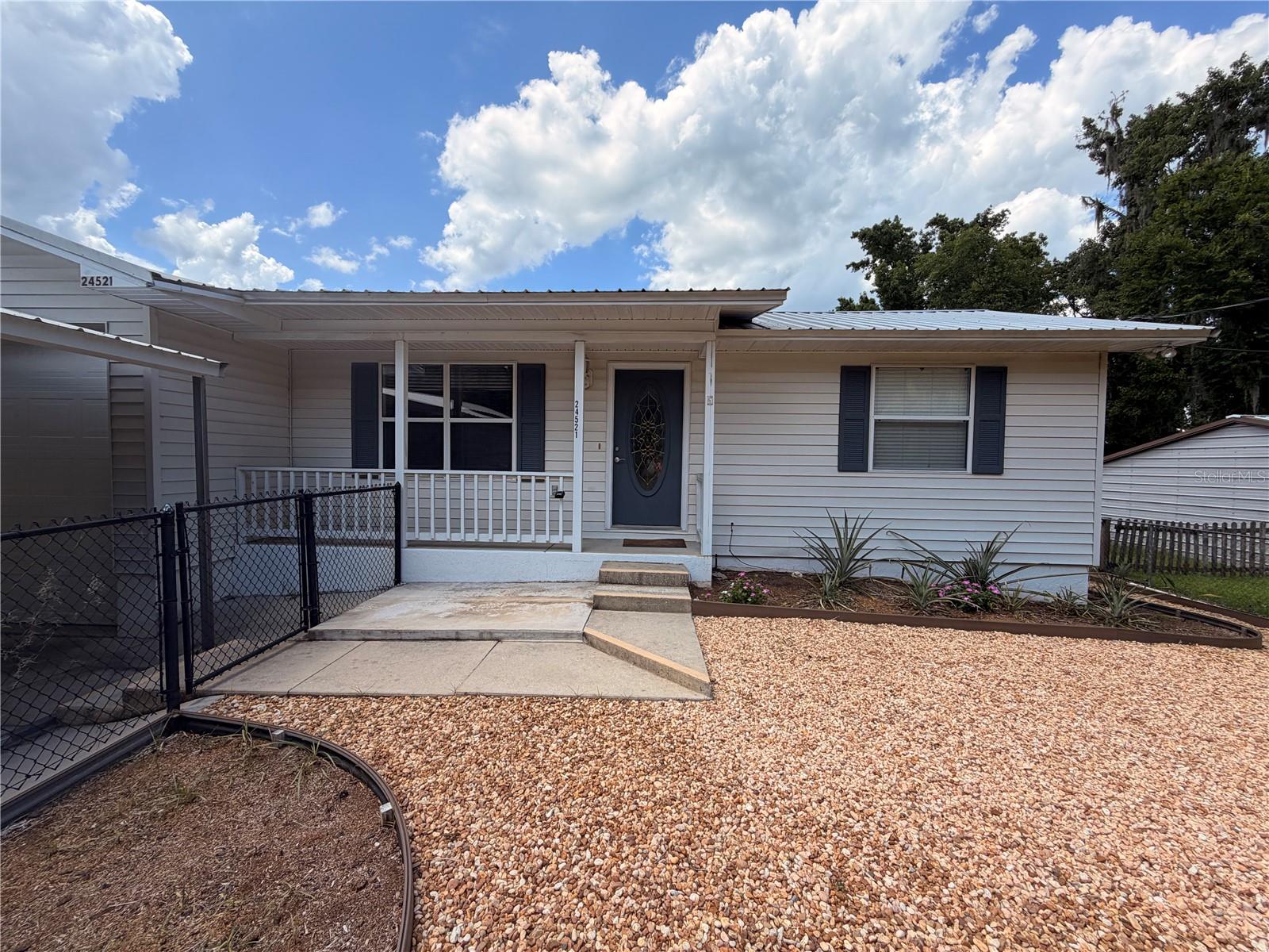 Huge Price Reduction on this Waterfront home!! Bring the fishing poles, and all the river toys! This canal-front site built home sits on a block foundation and offers 3 bedrooms, 2 bathrooms,a large attached garage, an irrigation system, plus a super-sized carport perfect for your boat, golfcart, RV, or entertaining crew.  Relax on the screened porch and enjoy peaceful water views, cool breezes, and the easygoing Florida lifestyle everyone dreams about.
The real showstopper? A BRAND-NEW BOATHOUSE with TWO Boat slips and lifts- Never used and ready for your vessels! Launch into unforgettable days on the water with quick access to fishing, cruising, waterfront dining, and sunset rides right from your own back yard.
Perfect as a full-time residence, snowbird escape, weekend getaway , or income-producing vacation rental. This is your chance to own a slice of river paradise where every day feels like a vacation!