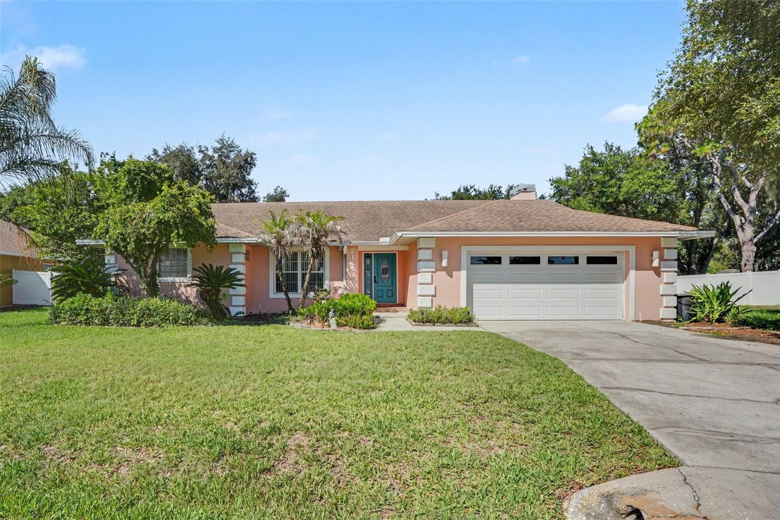 Featuring 3 bedrooms and 3 full baths, the home includes two en-suite bedrooms, while the third bath serves as both a convenient guest bath and pool bath with direct access to the screened lanai and pool area. The inviting floor plan offers a spacious kitchen, family room, and dinette combination, creating the perfect gathering space for everyday living and entertaining. The family room is accented by a cozy wood-burning fireplace, while additional features include an inside laundry room, two-car garage, and generous living spaces throughout. Freshly painted both inside and out, this home is move-in ready. Step outside and enjoy Florida living at its finest. The outdoor living area features a 14’ x 28’ screened pool with spa, attractive paver decking, and an expansive 26’ x 11’ covered lanai, plus additional uncovered patio space ideal for entertaining family and friends or simply relaxing poolside. Combining timeless design, a sought-after location, and exceptional indoor and outdoor living spaces, this beautiful Deer Brooke home is ready for its next chapter.  All measurements are approximate and must be verified by buyers.