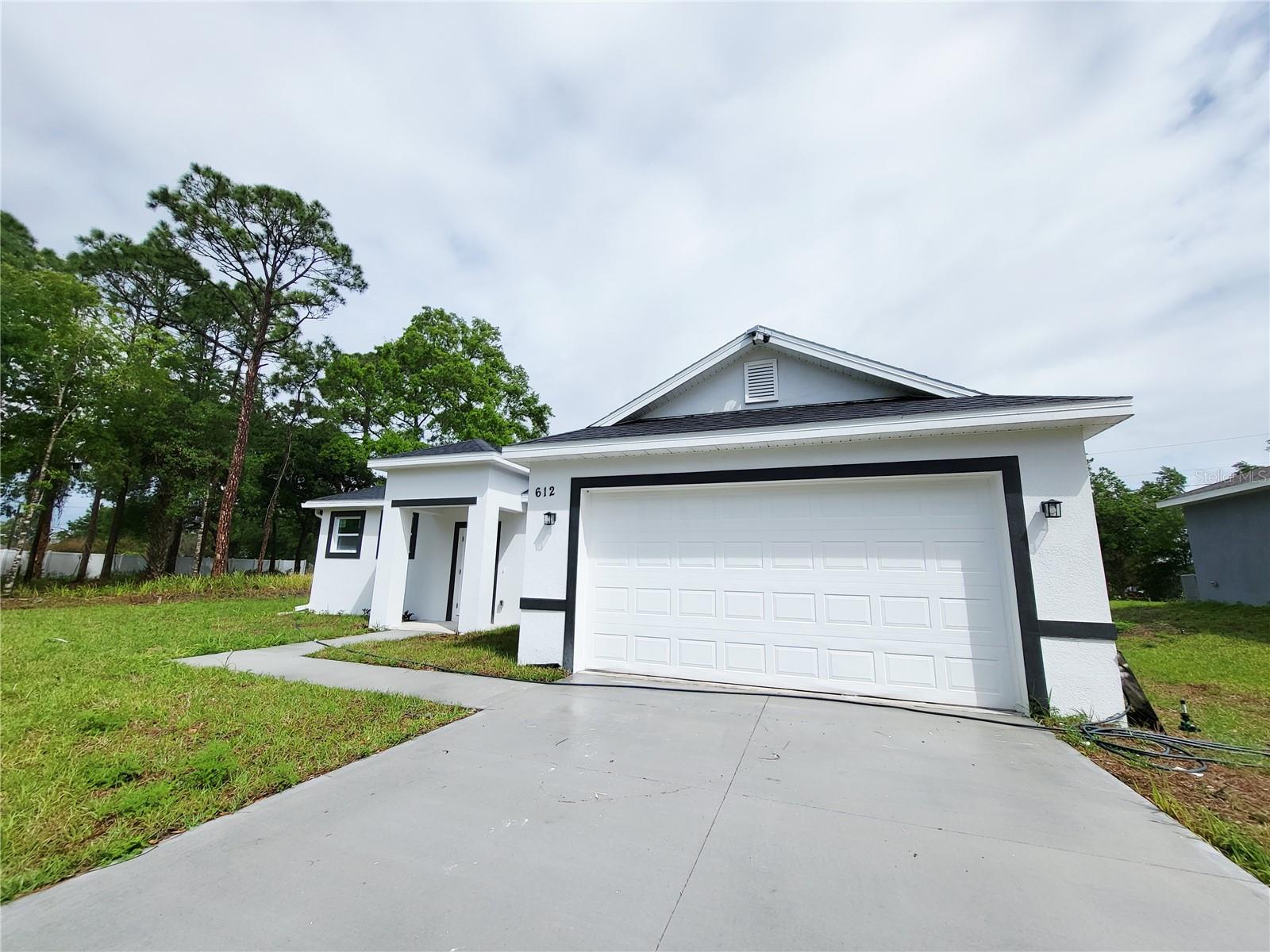 Virtually Staged. Custom finishes other builders skip. A layout that actually works. And an address in one of Florida's fastest-growing cities- without an HOA.
This 3-bedroom home on Waycross Road SW delivers the kind of thoughtful design that stands out in SW Palm Bay's inventory: tile flooring flowing through the living areas for warmth and continuity, a kitchen anchored by an elegant island that functions as both the practical center of the home and its natural gathering point, and three bedrooms plus a dedicated bonus room that adapts to how you actually live — home office, fitness room, guest quarters, or flex space for a growing household.
Natural light fills the living areas throughout the day, reinforcing a sense of openness that photographs well and lives even better. The balance is deliberate: modern without feeling cold, finished without feeling overbuilt.
Outside, the property sits on a quiet residential street with the lot space that Palm Bay's SW quadrant is known for — room to breathe that newer HOA communities have largely traded away. No association fees, no restrictions, no approval process.
The location context matters here. Palm Bay is home to L3Harris Technologies' 464,000-square-foot technology center- the Space Coast's largest high-tech employer- along with Northrop Grumman, Lockheed Martin, Boeing, Raytheon, and Collins Aerospace, all accessible within a 15–25 minute commute north via I-95 or Babcock Street. Brevard Public Schools serve the city with A-rated schools and magnet programs with an aerospace and tech focus. Turkey Creek Sanctuary, in the heart of the city, offers 1.25 miles of boardwalk through a protected natural area, while the Indian River Lagoon supports boating, kayaking, fishing, and manatee viewing along the city's eastern edge. 
Palm Bay is the most affordable city on the Space Coast, offering larger homes and lots at lower prices than anywhere else in Brevard County - a combination that the defense and aerospace workforce that drives this market has been quietly capitalizing on for years.