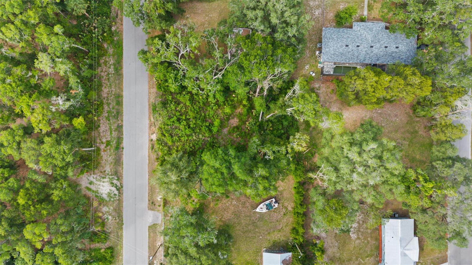 BUILD YOUR DREAM HOME!!! Nice-sized 0.22 Acre Lot spanning 9,375 square feet (75x125) located approximately 4 miles north of FL-52.  NO HOA!  NO CDD! No Flood Insurance (Zone X)!!  Just land ready for you to build your perfect home in serene Pasco Lakes Estates.  Minutes away from local shopping, restaurants and attractions like beautiful Weeki Wachee Springs where you can swim in crystal clear waters, be enchanted by live mermaid shows or simply enjoy a day in paradise, paddling one of Florida's most pristine spring fed rivers!  Don't wait - call now - and make the best of this amazing opportunity.