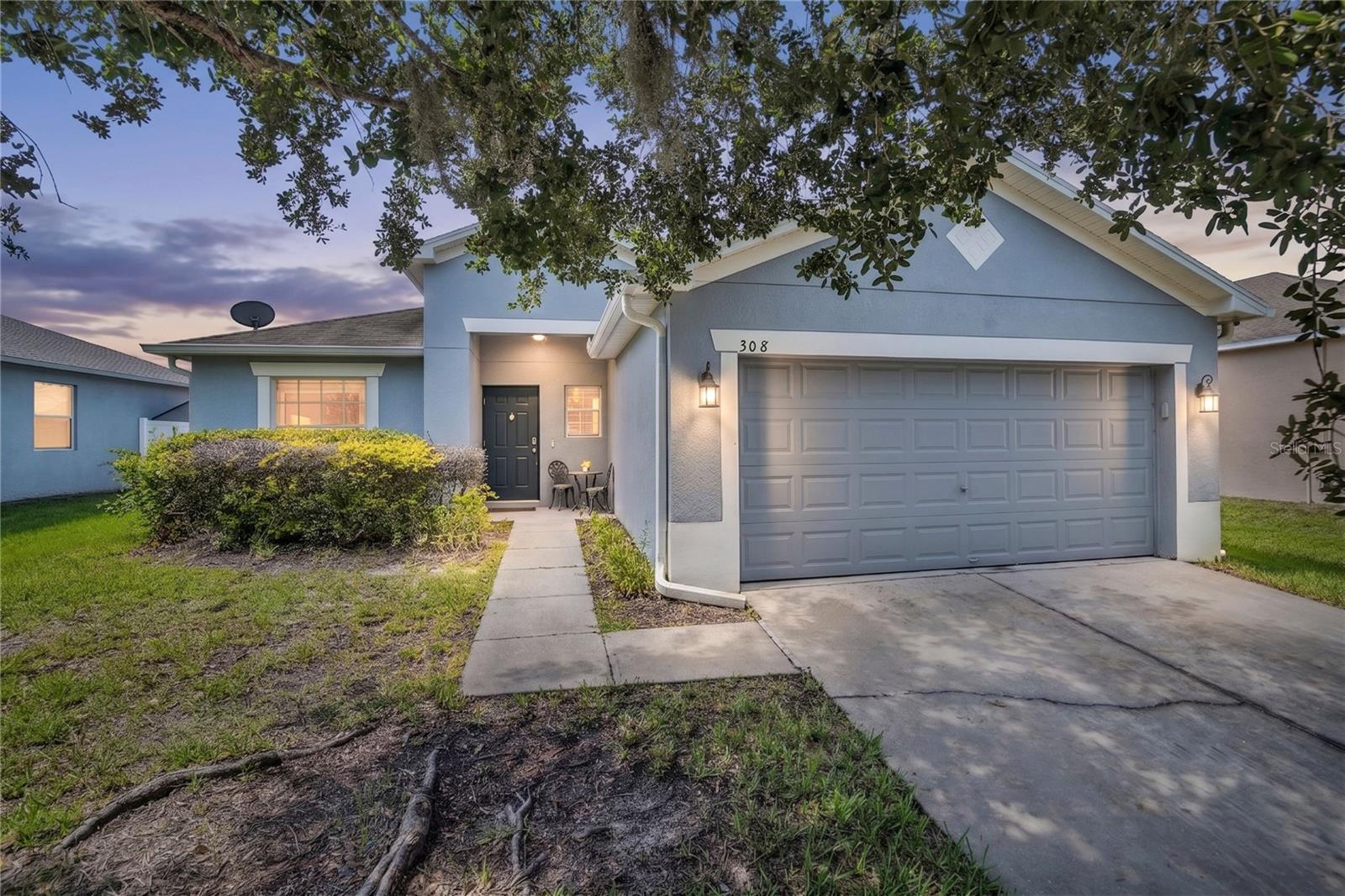 MOVE IN READY 3 bed, 2 bath home in Sanford’s Celery Estate North community! This Lennar built home features 9’4” ceilings, an open floorplan with a large family room, breakfast nook, split bedroom plan with luxury vinyl plank flooring in the living areas and bedrooms, a covered and screened in patio and 2-car attached garage. The foyer welcomes you into the home where the family and dining rooms will be in front of you and feature tall ceilings and luxury vinyl plank floors. The kitchen is on the right that features maple cabinets with crown molding and hardware, tile backsplash, a window overlooking the front yard, granite counters, newer appliances, a breakfast bar, closet pantry, breakfast nook, has a door leading to the laundry room and is open to the family room. The family room has vaulted ceilings and has a French door leading to the covered and screened in patio that overlooks the fenced yard. What a great space to enjoy your morning coffee or relax at the end of a long day! The owner’s suite is off the family room with views of the backyard, has vaulted ceilings with a new ceiling fan, luxury vinyl plank floors, a walk-in closet and an en-suite bath that features a new two-sink “adult height” vanity with cabinets and a glass enclosed tiled shower, The guest bedrooms are towards the front of the home on the other side of the family room and share the guest bath with a one sink vanity with cabinets and a tub/shower combo. Recent updates include a new fence, new dishwasher, luxury vinyl plan flooring, a new glass enclosure for the owner’s shower, new bathroom vanity in the owner’s bath, a Nest thermostat and new interior and exterior paint. This home has been beautifully remodeled and the backyard has enough space to built a pool! Community close to downtown Sanford and Sanford’s Riverwalk, major roads, the Sanford International Airport and great shopping and dining options. This would make a great starter home, a downsizer home or for an investor for a long term rental. See this home today!