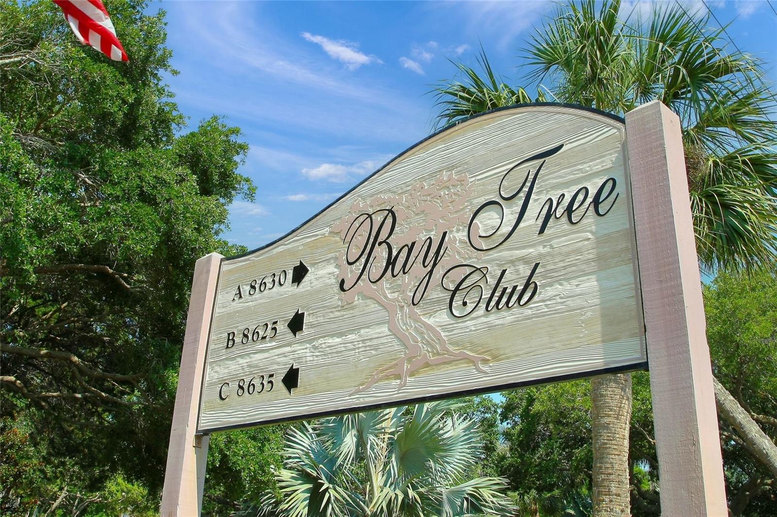 Rarely available top-floor 2-bedroom condominium offering truly spectacular, million-dollar water views. Bay Tree Club is a gulf-to-bay property that  provides the perfect Florida lifestyle. Enjoy breathtaking scenery of the Gulf from the comfort of your home while embracing the ultimate waterfront  living.    Gulf side has storage cabanas for your beach umbrella, chairs and bikes with secure restroom facilities just off the beachside path.  For BOATING ENTHUSIASTS, this property is a RARE FIND! Easy access to the newly reopened Midnight Pass! Boat slips are just steps from your door on the Bay side. Year round moorings to the TREX dock at no charge. Convenient access to the Gulf along with free electricity and water. A floating dock or lift can also be added.   Whether you're heading out for a day on the bay, enjoying sunset cruises, or simply appreciating the waterfront setting, this condo offers the perfect combination of comfort, convenience, and coastal living. Complex has two heated pools to provide the perfect spot for sunning or doing your laps. This condo was renovated to provide an open plan with IMPACT WINDOWS, UPDATED BATHS, TANKLESS HOTWATER HEATER, and IN UNIT LAUNDRY.  In addition to the in unit laundry there is a laundry on all levels, elevator, full-time maintenance and onsite manager.  The kitchen flows seamlessly into the dining/living combination.  But the real living takes place from morning till sunset in the enclosed 14' X 8' loggia that can accommodate for cocktails, bridge, or just relaxing as the sun sets over the gulf horizon. Contiguous ceramic tile floors throughout, set diagonally add to the open feeling. Many cabinets and drawers in this kitchen with a breakfast island.  Plenty of counter space covered in classic black granite.  The guest room has its own ensuite bath and a Murphy Bed hidden behind a moving bookshelf should an office be needed. Conveniently located near the free trolley stop, you’ll have easy access to explore Siesta Village’s restaurants, shops, and the world famous Siesta Key Beach.  The Siesta Key Trolley travels right by the front door 7 days a week from 10-10 and until midnight on weekends to make a trip to the Siesta Key Village easy and convenient.  Unit comes furnished!