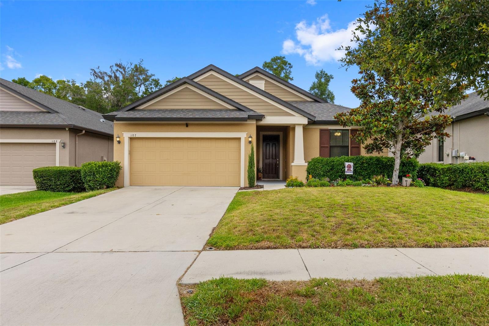 Welcome to 107 Elina Sky Drive, a beautifully maintained, move-in-ready gem ideally located in the heart of Seffner with low quarterly HOA fees and NO CDD. Built in 2019, this single-story residence boasts four spacious bedrooms, two full bathrooms, and an expansive 1,921 square feet of meticulously designed interior living space featuring fresh interior paint throughout. The kitchen is designed for both everyday living and entertaining, with sleek granite countertops, a center island perfect for casual dining, premium cabinetry offering ample storage, and newly installed stainless steel appliances including the refrigerator, dishwasher, and garbage disposal. Step out through the rear doors to a covered lanai and enjoy true Florida living on a substantial 9,583-square-foot lot. This expansive, nearly quarter-acre backyard oasis comes complete with lovely garden beds and industrial-grade playground equipment, leaving plenty of room for summer barbecues or a future pool installation. Additional features include an attached two-car garage featuring upgraded epoxy flooring, an irrigation system that covers both the front and back lawns, modern central HVAC system, and a comprehensive alarm system equipped with exterior cameras. Located in a tranquil yet highly accessible neighborhood, this spectacular property is just minutes away from local schools including Lopez Elementary and lush community spaces like the Seffner Community Park & Gardens. With quick access to I-4, Highway 60, and I-75, you will enjoy a seamless commute to shopping, dining, and entertainment in Brandon, downtown Tampa, and Lakeland. This property offers an unparalleled combination of location, functionality, and thoughtful upgrades, making it the absolute perfect place to call your next home!