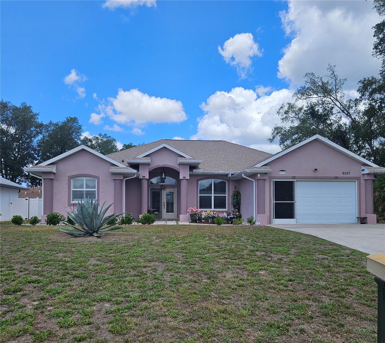 Lovely, well-maintained three-bedroom, two baths home situated on a spacious corner lot. Step inside to soaring 12-foot vaulted ceilings and living room area featuring built-in entertainment center. This desirable split floor plan offers privacy and comfort with an oversized primary suite that includes space for a home office or cozy reading nook, plantation shutters, pocket sliders leading to the air-conditioned Florida room. Ceramic tile flooring runs throughout the home, and the kitchen is equipped with a reverse osmosis drinking water system. The garage features a sliding screened door perfect for enjoying fresh Florida breezes while keeping the bugs away. The backyard offers plenty of room for a future pool, creating the perfect outdoor retreat. Major updates include a new roof in 2023, an HVAC replaced in 2021 and kitchen appliances updated in 2020. Conveniently located in a desirable area of North Port near shopping, golf courses, parks and restaurants - all with no HOA fees. Don't delay - schedule your private showing today.