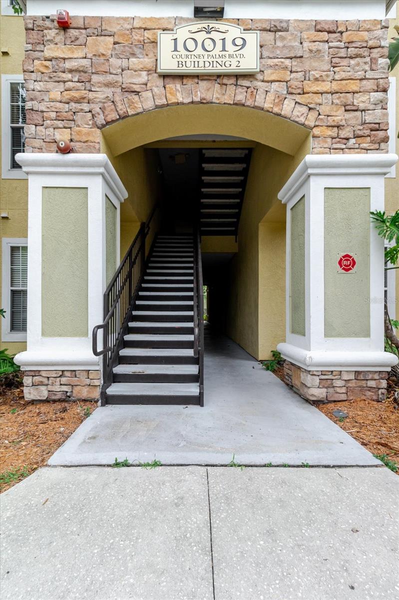 This updated first-floor condominium in the highly sought-after gated community of Courtney Palms offers the perfect blend of style, comfort, and convenience. Featuring 1 bedroom and 1 bathroom, this move-in-ready home showcases beautiful tile flooring throughout, creating a seamless and modern look with easy maintenance.

The updated kitchen is designed to impress with contemporary finishes, a convenient breakfast bar, and elegant ambient lighting that creates a warm and inviting atmosphere. The renovated bathroom offers a fresh, modern feel, while the spacious bedroom features a large walk-in closet for ample storage.

Enjoy relaxing on your private screened lanai overlooking the beautifully maintained community grounds. An additional exterior storage closet provides extra space for your belongings.

Courtney Palms is known for its outstanding management and resort-style amenities, including a spectacular swimming pool, elegant clubhouse, state-of-the-art fitness center, basketball court, and racquetball facilities. Ideally located near shopping, dining, entertainment, and everyday conveniences, with quick access to the Selmon Expressway and I-75. Downtown Tampa, Water Street, Channelside, and the Riverwalk are just minutes away, while Florida's award-winning Gulf beaches are approximately 20 miles away.

Whether you're looking for a primary residence, seasonal getaway, or investment opportunity, this beautifully updated condo offers exceptional value in one of Tampa's most desirable communities. Schedule your private showing today!