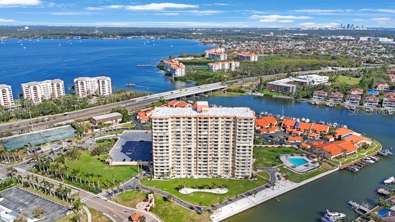 Location, Fantastic Water View, Convenience, these are what this Unit has to offer. A must see unit located minutes away St. Pete Beach, St. Petersburg, Fort Desoto Park, and easy access to Interstate 275. This corner unit next to the laundry room, has two bedrooms (with walk in closets), two baths unit has a thirty foot balcony over looking Boca Ciega Bay. Now that is what I call a must see outstanding Water view. Some of the amazing amenities ,for this 55 Plus community, includes heated pool, fitness center, clubhouse, pool room, library, fishing dock and card room, underground garage (C-60). On site electric charging stations. Last but not least, is the convenience having on site your own Market (butcher, deli, produce, etc.) in walking distance. Everything that makes life enjoyable is located right here in Point Brittany, just ask the residents. To enjoy Island living, is to see this exceptional UNIT. As they say(You Snooze You Loose) Looking forward to hearing from you.