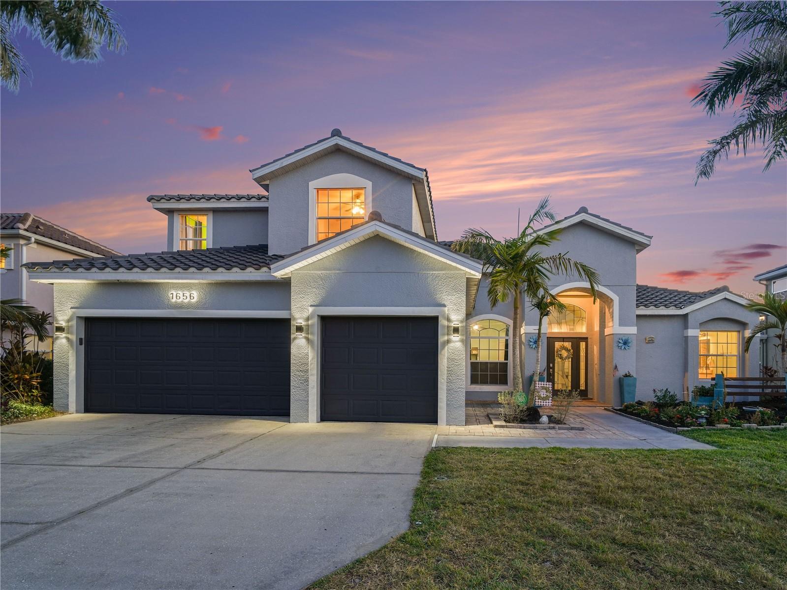 Back on the Market! Welcome to your dream home in the heart of Sarasota, where luxury, flexibility, and location come together seamlessly. Situated in a highly sought-after community with low HOA fees and no CDD fees, this beautifully maintained 5-bedroom, 3-bathroom single-family home delivers the perfect blend of comfort, functionality, and modern Florida living. Ideally located near top-rated Sarasota schools, including highly regarded Tatum Ridge Elementary, as well as premier shopping, dining, medical facilities, parks, and world-famous Gulf Coast beaches, this exceptional residence is designed to accommodate growing families, remote professionals, and multigenerational living. Step inside to discover a spacious open-concept floor plan filled with natural light, luxury vinyl flooring throughout the main living areas, and freshly painted baseboards that enhance the home's clean, modern appeal. The refreshed exterior paint, upgraded exterior lighting, and impressive curb appeal create a warm and welcoming first impression. At the heart of the home, the chef-inspired kitchen features stainless steel appliances, granite countertops, abundant cabinetry, a water filtration system, and generous prep space perfect for entertaining, holiday gatherings, and everyday living. The seamless flow between the kitchen, dining, and living areas creates an ideal environment for family connection and entertaining guests. The first-floor primary suite serves as a private retreat, complete with sliding glass doors leading directly to the screened lanai. The spa-inspired en-suite bathroom features dual vanities, an oversized tiled walk-in shower, and a private water closet. A dedicated home office overlooking the front grounds provides an ideal workspace for remote work, homeschooling, studying, or creative pursuits. Perfectly suited for multigenerational households, the home includes a separate first-floor guest suite and full bathroom, creating an ideal space for extended family, aging parents, visiting guests, or a private in-law suite. Upstairs, three additional bedrooms are thoughtfully arranged in a split-bedroom layout, providing flexibility for family members, guests, fitness space, hobby rooms, or additional office needs. Outdoor living shines with an expansive screened-in patio and relaxing spa, creating the perfect setting for year-round enjoyment. Wiring is already in place for future pool installation, offering a pool-ready backyard with endless possibilities. The fully fenced backyard overlooks a peaceful pond, providing beautiful water views, privacy, and plenty of room for pets, play, gardening, or future outdoor enhancements. Additional upgrades include a brand-new tile roof, fully paid-off solar panels for exceptional energy efficiency and long-term utility savings, a new water softener system, and a spacious 3-car garage with ample storage. This move-in-ready Sarasota home combines modern upgrades, sustainable living, flexible living spaces, and a desirable location near top-rated schools, making it a rare opportunity in one of Sarasota's most sought-after family-friendly communities. Experience the best of Sarasota real estate with this exceptional home offering space, privacy, energy efficiency, multigenerational living potential, and convenient access to everything the Gulf Coast lifestyle has. Schedule your private showing today.