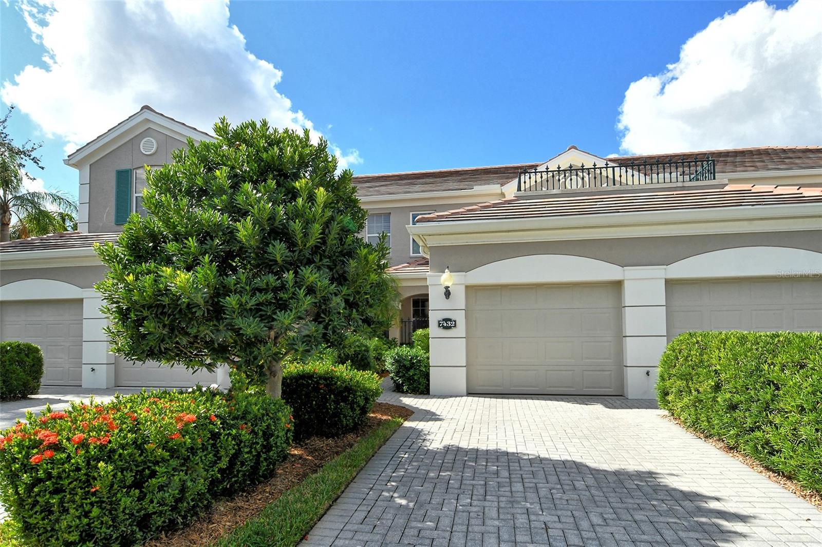 Welcome to the ultimate in maintenance free living. Located in the beautifully maintained community of Botanica on Palmer Ranch. This immaculate move in ready 2nd floor condo has it all. Very open floor plan with high ceilings expansive kitchen & private peaceful preserve views from the screened in covered porch. Featuring 2 bedrooms plus den & office alcove with 2 full baths. Numerous upgrades have been made including; new impact windows & front door, washer & dryer, new AC in 2022. Bathrooms have been updated with granite counters & new sinks. Kitchen appliances have been updated in 2019. Beautiful Bella wood floors throughout including master bedroom. The roof on this building was replaced in 2023 with new gutters & downspouts. Attached 1 car garage. Resort style amenities include clubhouse, fitness, pool & kitchen for events. Maintenance  is covered by the association fee includes: maintenance of exterior & grounds, manager, reserve funds, exterior insurance, cable TV, water & sewer. Streets are private in this gated community. Located in the heart of Palmer Ranch just minutes from shopping & close to Siesta Beach.