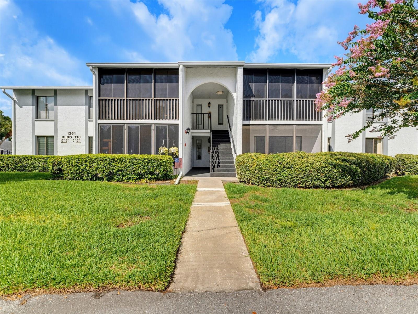 Amazing opportunity with this tastefully renovated first-floor condo. Step into this spacious 2-bedroom, 2-bath home in Pine Ridge at Lake Tarpon, where an open floor plan and tranquil views create the perfect retreat. The updated kitchen boasts stone countertops, new appliances, and plenty of cabinet space, seamlessly connecting to the living and dining areas. The large primary bedroom offers a generous walk-in closet and a private en-suite with a modern vanity and tiled walk-in shower. Additional highlights include a dedicated laundry room with a washer and dryer, an enclosed lanai that extends your living space, and fully updated guest bathroom. This well-maintained community offers resort-style amenities including a heated pool, spa, clubhouse, tennis court, BBQ grills, and scenic walking and biking paths. Low quarterly condo fees include water, trash, cable, escrow reserves, and exterior maintenance. Don't miss this amazing opportunity, schedule your showing today!