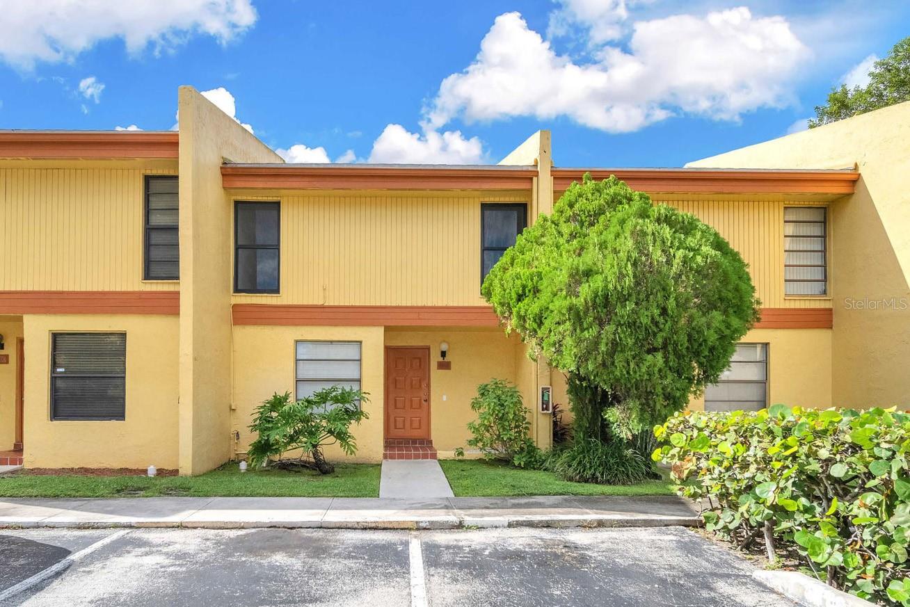 One or more photo(s) has been virtually staged. Welcome home to this charming 3-bedroom, 2.5-bath condo in the heart of Pembroke Pines! Offering a spacious open-concept living and dining area, this home is perfect for both everyday living and entertaining. The updated kitchen features stainless steel appliances, ample cabinet storage, and a convenient passthrough to the dining room. Retreat to the generously sized primary suite, complete with an en suite bath featuring a large walk-in shower. Two additional bedrooms and a full bath provide plenty of space for family, guests, or a home office. Easy to maintain tile flooring runs throughout the home, adding both style and convenience. Step outside to your private patio and enjoy peaceful pond views—a perfect spot to relax with your morning coffee or unwind at the end of the day. The condo fee covers exterior maintenance, lawn care, cable, insurance, trash service, and access to fantastic community amenities, including a pool, clubhouse, and fitness center. Ideally located near shopping, dining, and major roadways, with quick access to the Florida Turnpike, this home offers comfort, convenience, and low-maintenance living in a sought-after Pembroke Pines location.