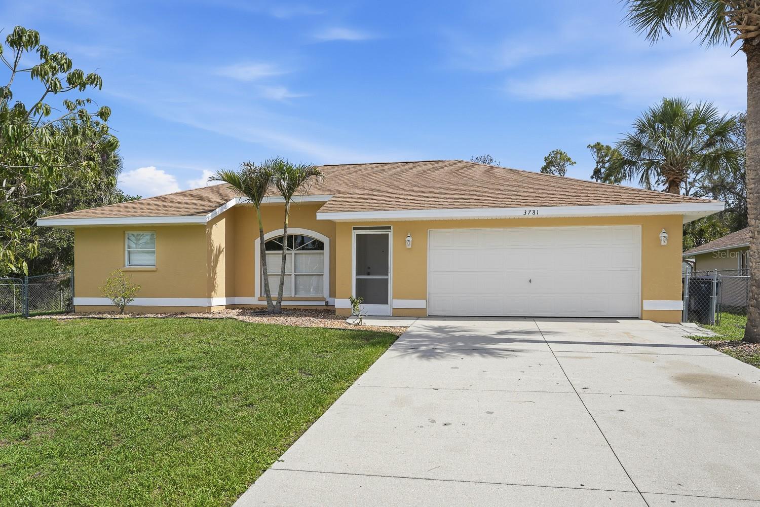 One or more photo(s) has been virtually staged. 20k Price reduction!! New roof in 2023! Welcome to this charming, move-in-ready single-family home offering comfort and functionality in one of Southwest Florida’s fastest-growing communities! This well-maintained 3-bedroom, 2-bathroom block home features an airy and welcoming atmosphere, highlighted by an ideal split floor plan and impressive vaulted cathedral ceilings. The home has been beautifully updated with fresh paint inside and out, brand-new lighting fixtures throughout, and easy-to-maintain tile flooring in the main living areas.    

The bright living room naturally flows into a highly functional kitchen, equipped with ample cabinet space and brand-new appliances. The primary bedroom serves as a peaceful private retreat with its own en-suite bath, while the split bedroom design ensures maximum privacy for family or guests. Step outside to discover a large, fully fenced backyard complete with a screened lanai—the perfect setting for relaxing, entertaining, or letting pets roam safely.    

This home has several highly desirable features that set it apart. You will benefit from a city water connection, which is rare and highly sought-after in this area. The attached 2-car garage has been upgraded with a durable epoxy floor and offers fantastic extra storage space. Best of all, there are absolutely no HOA fees, giving you the ultimate freedom to make this property your own.    

Unbeatable Location & Connectivity    
This property offers an unbeatable combination of peaceful suburban living and modern convenience. It sits under 3 miles from the upcoming Sarasota Memorial Hospital (SMH-North Port) campus and is just minutes from the current Sarasota Memorial Health Care Center & ER. 

Daily errands are a breeze, as residents will appreciate being close to essential shopping, restaurants, and everyday amenities, with incredibly easy access to both US-41 (Tamiami Trail) and Interstate 75.    

When it is time to relax or explore, you will find yourself ideally positioned near top regional destinations. You are just a quick 15-minute drive to the vibrant dining, shopping, and community events at the master-planned Wellen Park. 

Beach and destination access are also excellent: the beautiful shores of Manasota Key and Englewood Beaches are about 13 to 19 miles away, taking roughly 20 to 30 minutes. Venice, Siesta Key, Sarasota and Punta Gorda are also close-by.

The Sunseeker Resort is one of the nearest destinations at just 10 to 15 miles (15–25 minutes). For longer trips or commuting, Nokomis and Venice Beach are 16 miles (20–25 minutes), Punta Gorda is 15 miles (20–25 minutes), Sarasota is 34 miles (35–45 minutes), and Fort Myers is easily accessible within 45 to 60 minutes (41–49 miles).

Located in Flood Zone X for added peace of mind, this property represents exceptional value with no HOA fees.