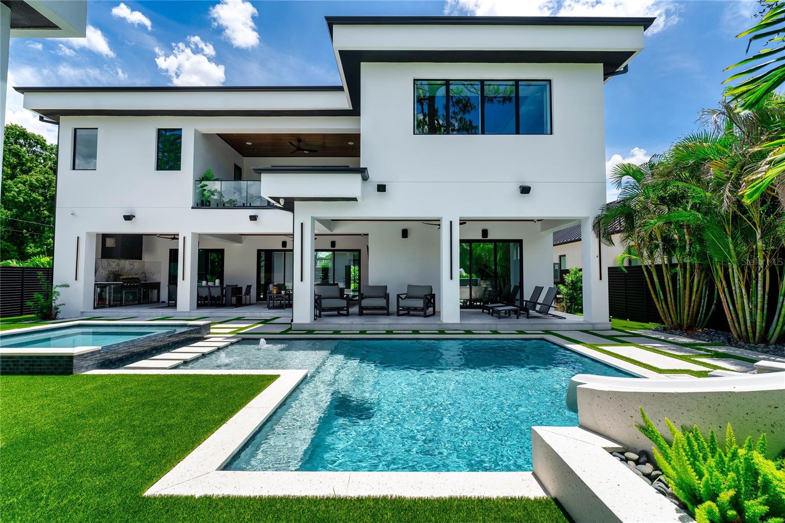 Pre-Construction. To be built. Modern Luxury Living at Its Finest – 5,700 SF Two-Story Masterpiece
Experience elevated living in this stunning 5,700 sq ft modern two-story home, thoughtfully designed for both luxury and functionality. From its striking architecture to its sun-kissed outdoor spaces, every detail has been crafted to impress.

 Key Features:
* Expansive 5,700 square feet of modern open-concept living
* Custom floating staircase as an architectural centerpiece
* Inviting sunlit pool with spa—your private backyard retreat
* Spacious 3-car garage with option to expand
* Outdoor kitchen perfect for entertaining under the Florida sun
* Optional elevator for ultimate accessibility and future-proof comfort
* Optional flex space ideal for gym, media room, home office, or guest suite
Located in one of Tampa’s most sought-after neighborhoods Sunset Park, this custom-built home is the perfect blend of sleek modern lines and warm, livable elegance.
 Photos shown are from a previously completed home by Neo Homes and are intended to represent the quality, craftsmanship, and level of finishes available for this homesite.
 Schedule your private tour and explore the possibilities of custom living at its finest.

Note - Photos are from another home that the builder recently built and are merely representative of what we can build together on this lot!