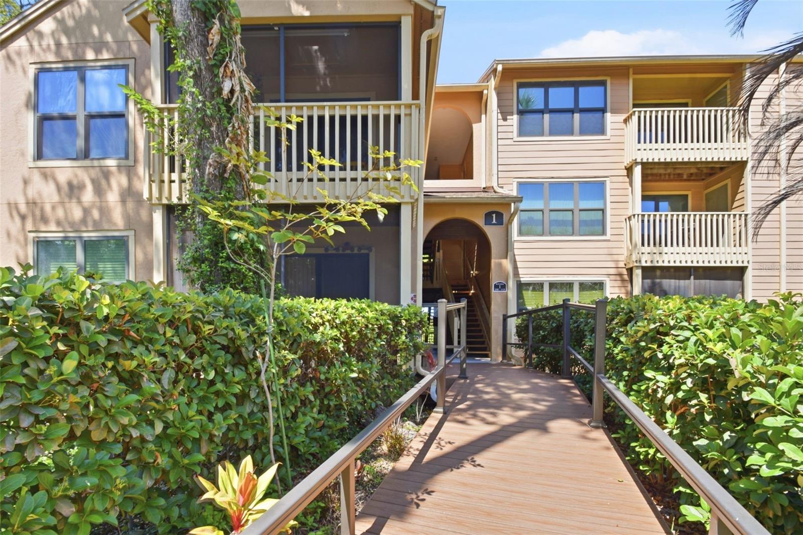 Welcome to peaceful, maintenance-free living in the gated community of Preserve at Rivers Edge!  This well-maintained FIRST-FLOOR FURNISHED condo offers a serene setting along the Halifax River, surrounded by lush mangroves and natural beauty. The efficient studio-style layout features a thoughtfully designed separate bedroom area, comfortable living space, and a full kitchen with breakfast bar, creating a functional and inviting environment. The spacious bathroom includes an oversized vanity, and the in-unit washer/dryer combo adds everyday convenience. Relax and unwind on your screened-in balcony overlooking the mangroves or take advantage of the community amenities just steps away—including the clubhouse, pool, spa, fitness center, car wash station, and scenic picnic/BBQ area with river views. Conveniently located near shopping, colleges, dining, entertainment, and just minutes to the famous Daytona Beach, this location offers the perfect balance of tranquility and accessibility.  Recent updates include WATER HEATER  (2025), WINDOWS (2023), and ROOF.  The HOA covers water, exterior maintenance, cable, internet, and amenities—keeping monthly expenses simple, with only electric paid separately. Enjoy a quiet, nature-filled lifestyle with easy access to everything you need—this is Florida living at its best!