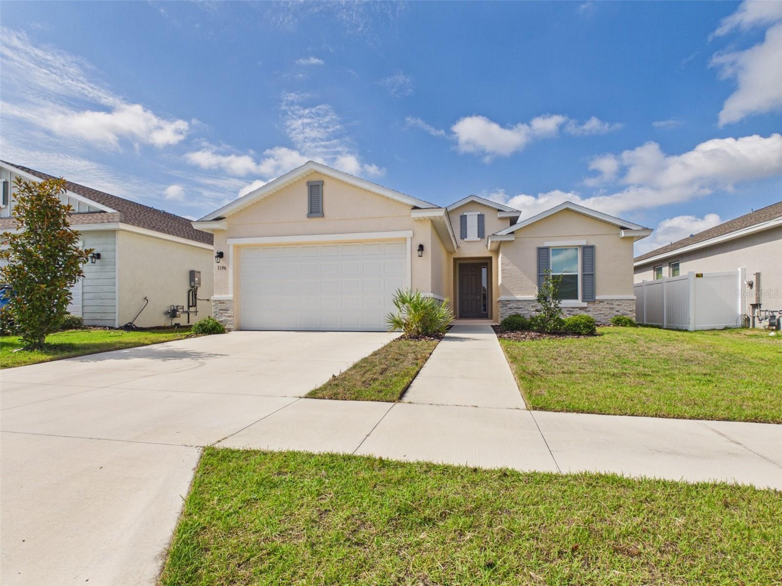 This stunning Garnet model in the Roan Hills neighborhood of Calesa Township is one of the community’s most popular floor plans for families. Featuring 4 bedrooms, 3 full bathrooms, and a 2-car garage, this thoughtfully designed home offers spacious living areas, including a great room, breakfast nook, laundry room, and a covered lanai.

Designed for modern living, the Garnet provides plenty of space for growing or active households. The primary suite features dual vanities and a spacious walk-in closet for added comfort and convenience. The upgraded kitchen showcases granite countertops, stainless steel appliances, a tile backsplash, and a large island perfect for casual dining and entertaining. Additional features include a gas water heater, washer, and gas dryer.

Tile flooring throughout the home adds both style and easy maintenance. Enjoy family meals in the formal dining area or gather around the kitchen island for more casual occasions.

Ideally located just 6 miles from the World Equestrian Center, this home also offers access to Florida Aquatics Swimming & Training, featuring lap swimming, a spray ground, and a fitness training room. Residents of Calesa Township enjoy an exceptional array of amenities, including dog parks, a basketball court, a resort-style pool, Adventure Park, and more, all conveniently located near shopping, dining, and everyday conveniences.
Schedule your tour today.