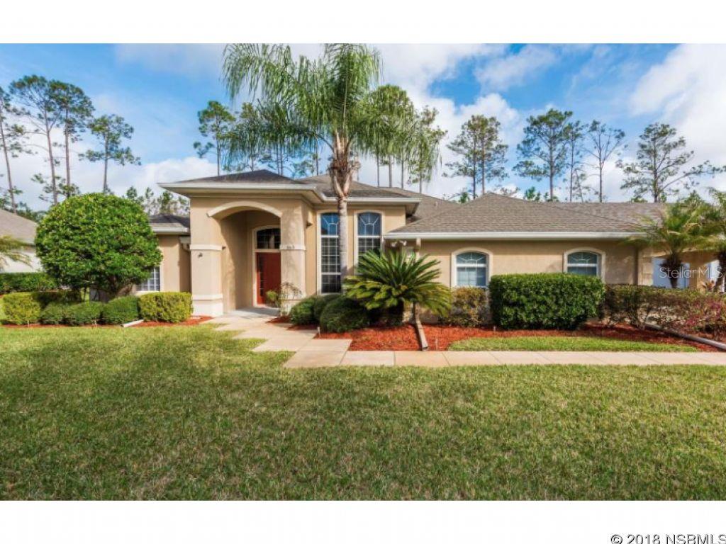 From the moment you drive up to this stunning pool home situated on a lush over sized lot, on a cul-de-sac with 6 car garage space, 2 car side entry and 4 car garage with air conditioning PLUS a 2 car portico, you will be in awe! This gorgeous home has been lovingly maintained and upgraded with the finest appointments. Owners added the 4 car garage, the 2 car portico, sunning area in backyard with pavers, fabulous built in pool bar with gas grill and refrigerator to keep your pool beverages ice cold, new pool pump, hot water heater 2 years new, granite counter tops in the kitchen, complete appliance package and the list goes on. The light and bright open floor plan is wonderful and the spacious kitchen will please even the pickiest chef's.Desired split bedroom plan, large closet space, generous master suite, inside laundry, delightful outdoor living space, spectacular screened lanai with sparkling in ground, salt water pool, perfect for entertaining, all backing up to green space. Close to top rated elementary school. This truly is a dream home with plenty of room for all your cars, toys, boat....it's the perfect package all wrapped up!Freezer in laundry room, glass case in 2 car garage, air compressor and metal cabinets in 4 car garage & master bedroom curtains do not convey.