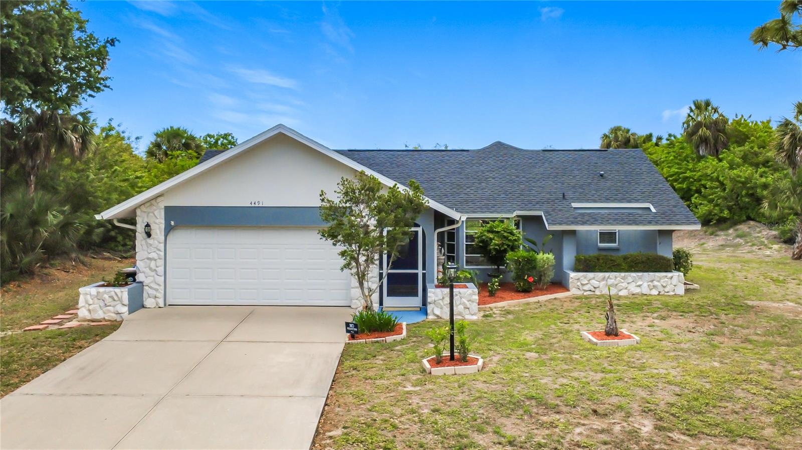 Welcome to this charming CANAL FRONT 2-bedroom, 2-bath home in North Port, where classic Old Florida living meets modern comfort. Perfectly situated on a desirable lot, this well-maintained property offers a relaxed WATERFRONT LIFESTYLE with direct access to the Myakka River—ideal for jet skis, kayaking, and exploring right from your backyard.  Inside, you’ll find a bright, squeaky-clean interior with luxury vinyl flooring installed in 2022 and no carpet throughout, offering both style and easy maintenance. The home features an updated, upscale primary shower that adds a touch of everyday luxury. Pride of ownership shines in every detail, from the freshly landscaped yard to the meticulously maintained living spaces.  Step outside to an oversized backyard with plenty of room to add a pool, creating your own private oasis. Major updates include a NEW ROOF stalled in 2022, providing peace of mind for years to come.  Whether you’re looking for a full-time residence, seasonal retreat, or a strong investment opportunity, this home checks all the boxes. The seller is open to negotiation on select furnishings (excluding the living room and primary bedroom sets), while personal and sentimental items will not convey.  Don’t miss your chance to own a slice of waterfront paradise and enjoy the very best of Florida living!