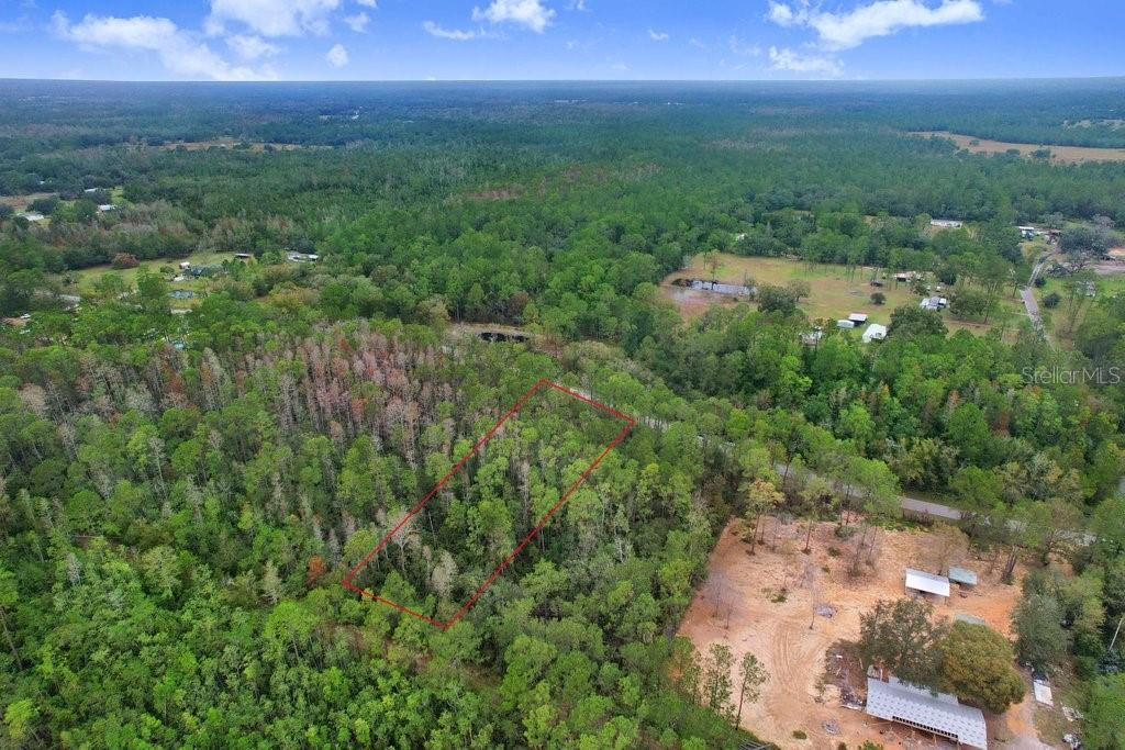 Welcome to your future dream property! Nestled on a spacious .89 acre (38,712 sq ft) parcel, this untouched, wooded lot offers endless
possibilities. Whether you envision building your custom home, creating a private retreat, or investing for future development, this property is
your blank canvas. The land is currently uncleared, providing natural privacy with mature trees and lush greenery, perfect for nature lovers or
those seeking a secluded oasis. With plenty of space to design your ideal layout and no existing structures to remove, this property gives you the freedom to bring your unique plans to life. Don't miss this rare opportunity to own nearly an acre of land to build your future on!