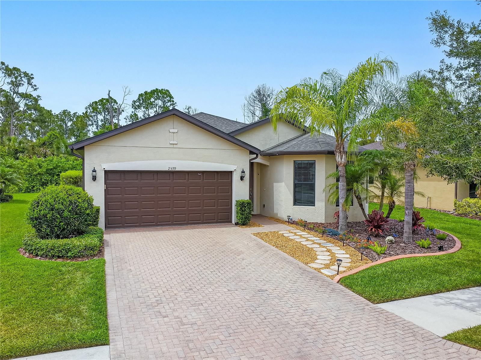 Welcome to this beautifully upgraded Marina model situated on a private preserve homesite with no rear neighbors in the highly desirable community of Cedar Grove in North Port. Featuring a brand-new roof and gutters (2024), extensive recent updates, and exceptional curb appeal, this move-in-ready home offers the perfect blend of comfort, privacy, and low-maintenance Florida living.

Recent improvements include professionally redesigned landscaping with decorative curbing and irrigation (2025), fresh interior paint throughout the main living areas (2026), and luxury vinyl plank flooring in the bedrooms (2023). The open-concept floor plan showcases staggered maple cabinetry, granite countertops, upgraded flooring selections, 8-foot interior doors, a builder-upgraded trim package, and a tray ceiling that adds architectural character and volume to the living room.

Additional builder features include an in-wall pest defense tubing system and lawn and landscape irrigation. The screened lanai provides the perfect place to relax and enjoy peaceful preserve views and Florida’s natural surroundings with no homes directly behind you.

Residents of Cedar Grove enjoy a low-maintenance lifestyle with lawn and landscape maintenance included through the HOA, along with access to community amenities including a resort-style pool, cabana, grilling area, and playground.

Conveniently located near Wellen Park, shopping, dining, parks, Gulf beaches, and the expanding Sarasota Memorial Hospital corridor, this home offers easy access to everything that makes Southwest Florida such a desirable place to live.

Meticulously maintained and thoughtfully upgraded, this property stands out as one of the finest Marina models currently available in the area.