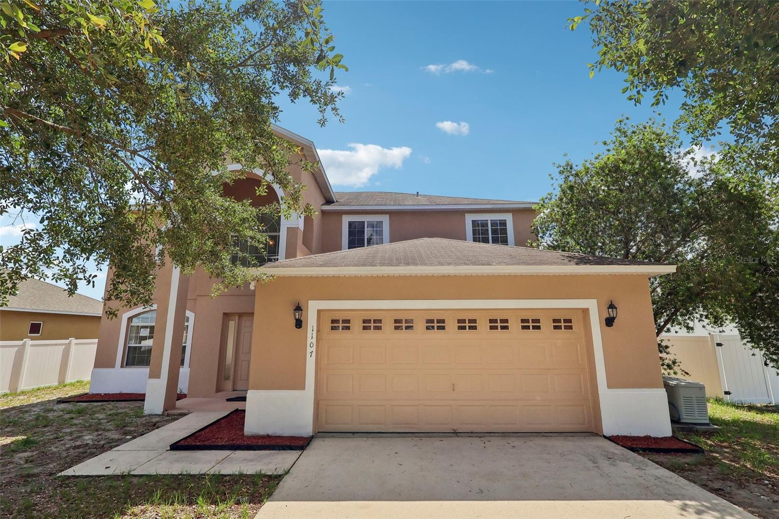 One or more photo(s) has been virtually staged. MOTIVATED SELLER***  New listing in the Poinciana community. This two-story traditional home features a motivated seller and several recent upgrades, including a brand-new AC unit, fresh paint, and new carpeting. The roof is approximately ten years old. The interior offers an impressive two-story entryway with high ceilings. The layout includes a spacious eat-in kitchen with counter seating, a formal dining room, a formal living room, and a family room. The home provides four bedrooms, 2.5 bathrooms, and a versatile bonus loft space. For added convenience, all bedrooms are generously sized and located on the upper floor, while a large laundry room is situated on the main level.  Ample storage is available throughout the property, including built-in garage shelving and an outdoor storage shed. Residents of the Poinciana neighborhood enjoy access to amenities such as multiple pools, sports courts, parks, and playgrounds. Additionally, the location provides easy access to Orlando’s amusement parks, shopping, and dining.