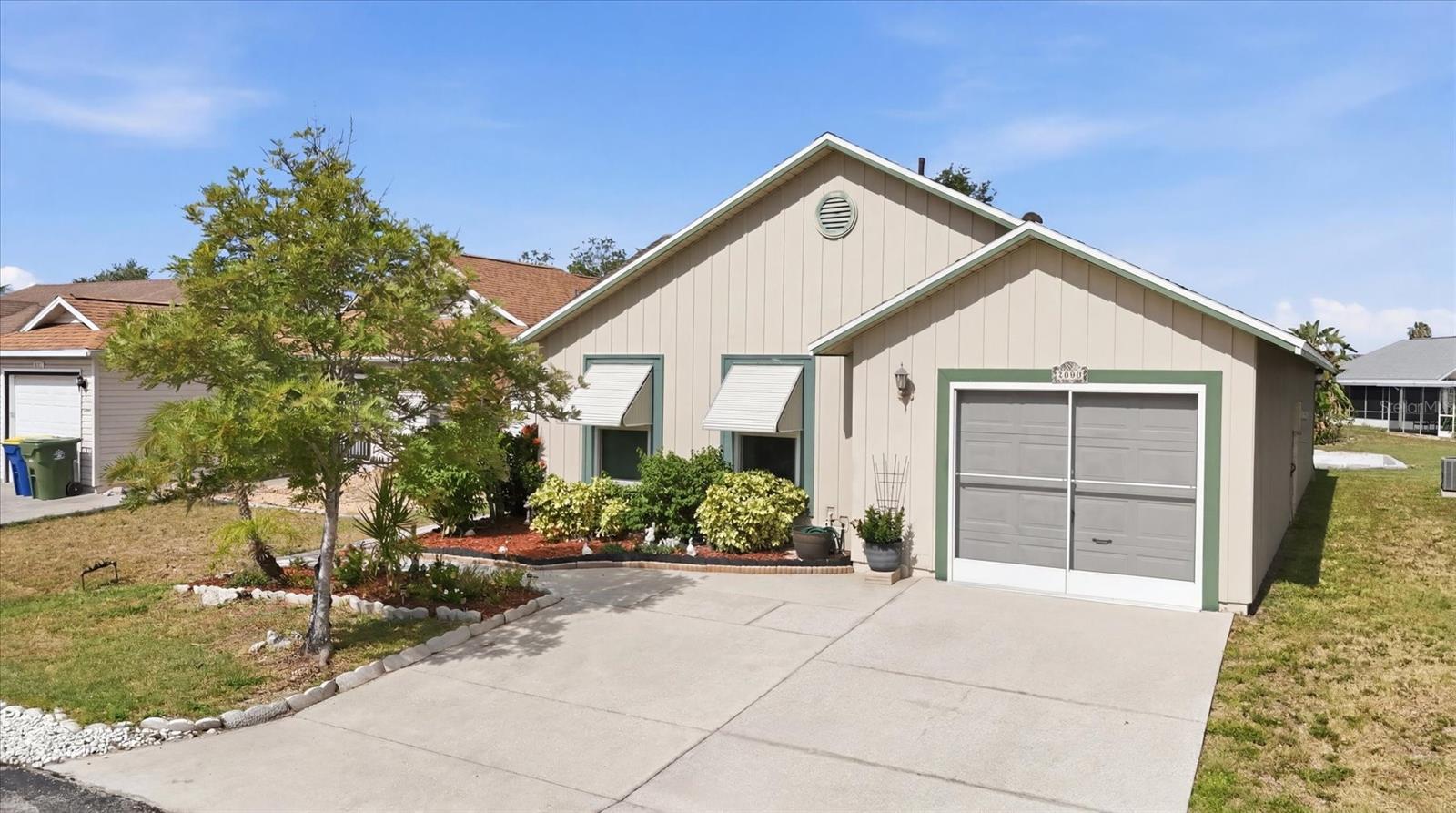 Move-in ready and meticulously maintained, this beautifully updated home in Lakeside South offers comfort, convenience, and worry-free living in one of West Bradenton's most desirable communities. This spacious 1,331-square-foot, 3-bedroom, 2-bath home with a 1-car garage has been exceptionally cared for and features numerous recent improvements, including a new roof (2024), A/C (2023), water heater (2021), eight hurricane impact windows (2020), front shade awnings (2017), newer screens and vinyl windows on the lanai, a new garage slider screen, garage door opener, microwave, garbage disposal, and a new dishwasher to be installed before closing.

The thoughtfully designed split-bedroom floor plan provides privacy for both owners and guests, while the spacious lanai offers the perfect place to relax and enjoy Florida living year-round. Durable steel siding helps resist mildew and minimizes exterior maintenance.

Living in Lakeside South means enjoying a truly maintenance-free lifestyle. The affordable $169 monthly HOA fee includes cable TV, high-speed internet, lawn maintenance, and access to outstanding community amenities, including a clubhouse, events, heated pool, tennis courts, pickleball courts, basketball court, and shuffleboard. The community is pet-friendly with no age restrictions, making it an excellent choice for a variety of buyers.

Ideally located just minutes from shopping, restaurants, medical facilities, GT Bray Park, downtown Bradenton, and the beautiful Gulf beaches of Anna Maria Island, this home combines exceptional value with an unbeatable location.

If you're looking for an updated, low-maintenance home in a welcoming community with outstanding amenities, this one deserves a spot at the top of your list.