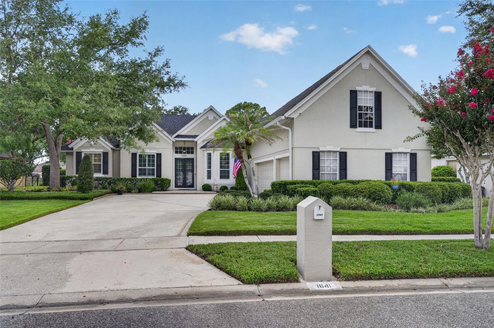 Perfectly positioned on a peaceful waterfront homesite, this beautifully updated pool home blends spacious everyday living with exceptional indoor-outdoor entertaining. Soaring ceilings, abundant natural light, and an open flowing layout create an inviting atmosphere from the moment you enter.  At the heart of the home, the kitchen opens seamlessly into the main living areas, offering the ideal space for gathering, entertaining, and enjoying tranquil water views from nearly every angle. The spacious upstairs bonus room provides incredible flexibility for a media room, game room, home gym, office, or multi-generational living setup.  The stunning primary suite, stylishly remodeled in 2021, feels like a true private retreat featuring dual custom vanities, elegant designer lighting, a freestanding soaking tub, oversized walk-in shower, and spa-inspired finishes throughout. Thoughtfully updated secondary baths and generously sized guest bedrooms continue the home’s thoughtful design and functionality.   Step outside to your own private resort-style oasis where the screened pool, resurfaced in 2026, expansive paver lanai, covered seating areas, outdoor bar, and breathtaking waterfront backdrop create an unforgettable setting. Mature trees and lush landscaping frame the peaceful lake views, making this outdoor living space ideal for both quiet evenings and entertaining on a grand scale.  Additional highlights include oversized 3 car garage, a spacious laundry room with utility sink and storage, modern fixtures, and meticulously maintained landscaping. Conveniently located near the University of Central Florida, walking distance to Carillon Elementary and Hagerty High School, and just minutes from shopping, dining, and major highways, this move-in ready waterfront home offers the perfect balance of comfort, style, and Florida living.