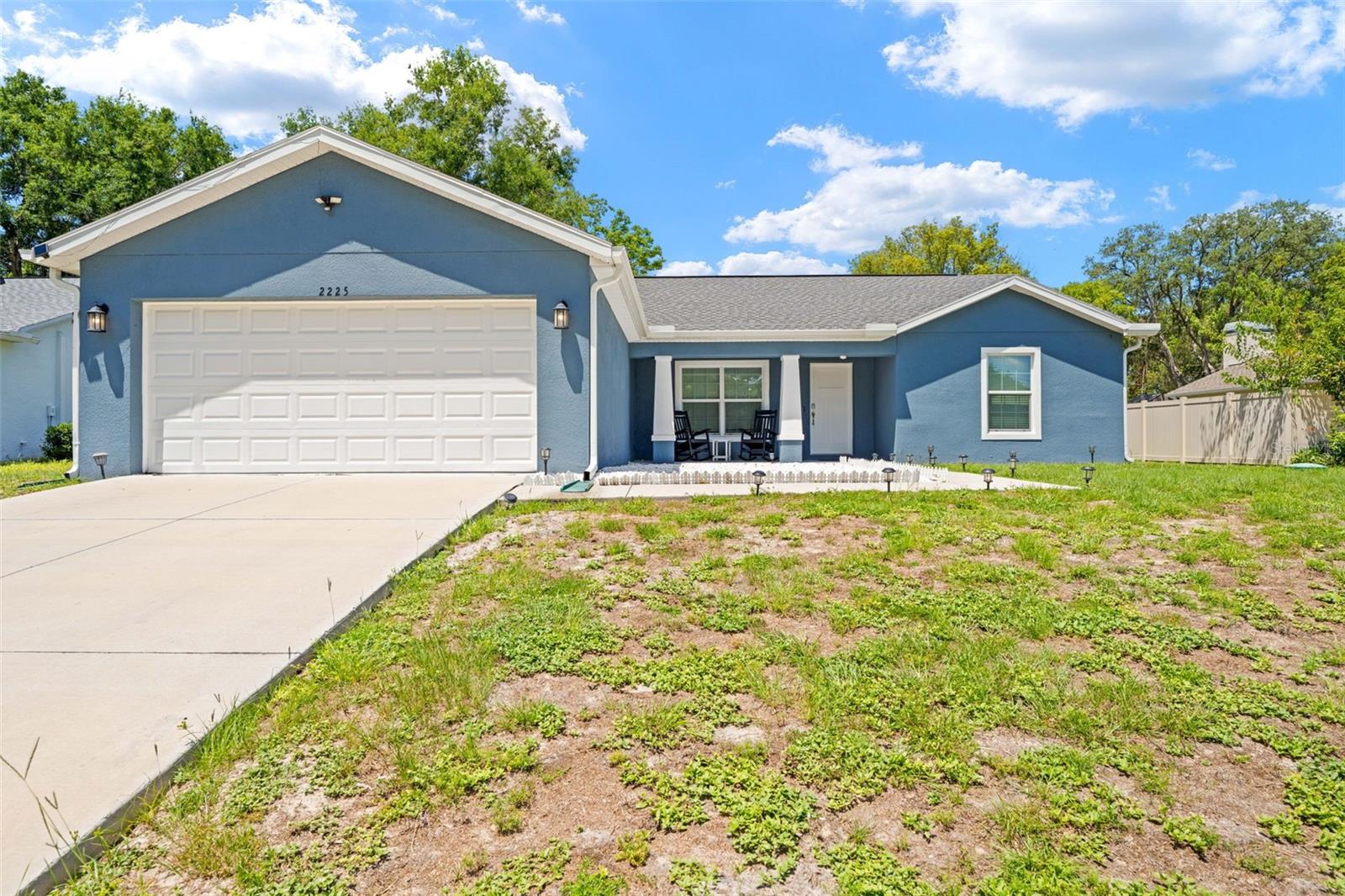 BETTER THAN NEW AND BUILT IN 2022! Why wait months for new construction when you can move right into this beautifully maintained, MOVE-IN READY HOME in the heart of Spring Hill? Designed for today's lifestyle, this home offers the modern features buyers are searching for, along with the peace of mind that comes with a recently built home.

Step inside and you'll immediately appreciate the OPEN-CONCEPT FLOOR PLAN, where the spacious living, dining, and kitchen areas flow seamlessly together—perfect for entertaining guests or enjoying everyday family life. The chef-inspired kitchen serves as the centerpiece of the home, featuring a large island, granite countertops, quality cabinetry, and stainless-steel appliances. Natural light fills the living spaces through energy-efficient windows and sliding glass doors, creating a bright and welcoming atmosphere.
The PRIVATE OWNER'S SUITE offers a relaxing retreat with generous space, oversized walk-in closets, and a well-appointed ensuite bath designed for comfort and convenience. A desirable SPLIT BEDROOM FLOOR PLAN provides privacy for family members or guests, while the indoor laundry room and oversized garage add everyday functionality and extra storage.

Located in a desirable Spring Hill neighborhood, you'll enjoy quick access to shopping, dining, schools, medical facilities, and the Suncoast Parkway for an easy commute to Tampa and surrounding areas.
If you've been searching for a modern, low-maintenance home that feels like new, 2225 Ring Rd is the opportunity you've been waiting for.

Schedule your private showing today before it's gone!