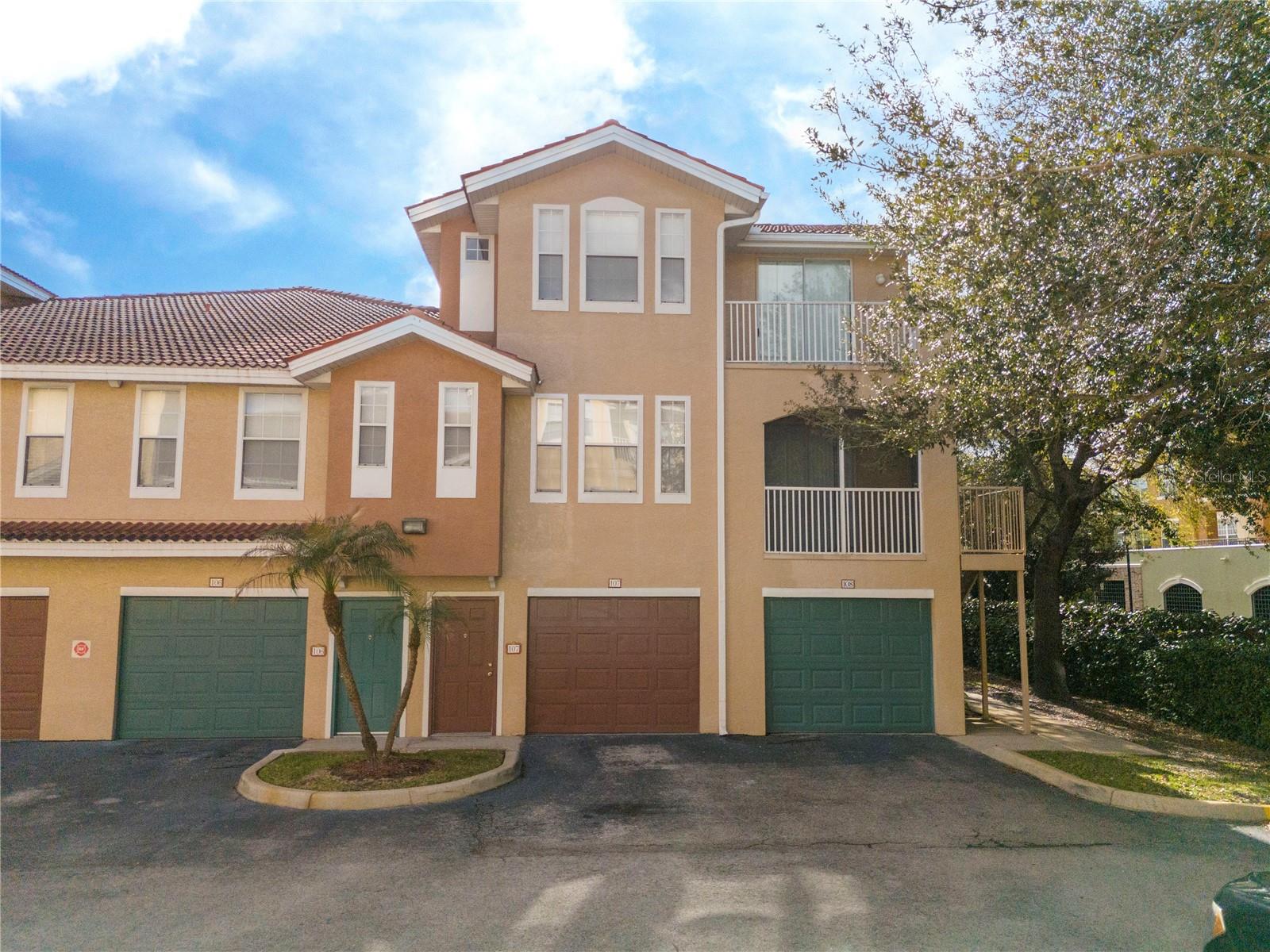 Stunning 3-Story Condo in Hunters Creek | 3 Beds, 3.5 Baths, Garage & Dual Balconies in Gated Community. Discover this beautifully maintained three-story condo featuring 3 bedrooms and 3.5 bathrooms, complete with a private garage and a modern, carpet-free interior for a clean, contemporary feel and easy maintenance. This spacious and thoughtfully designed layout offers multiple living areas, ideal for both everyday living and entertaining, along with two private balconies—one on each level—perfect for relaxing and enjoying the Florida lifestyle. Located in the highly desirable Hunters Creek area, this home is nestled within a gated community offering privacy and access to a refreshing community pool. Hunters Creek is known for its exceptional quality of life, with top-rated schools, scenic parks, walking trails, and a wide variety of shopping and dining options. With easy access to major highways, commuting to Downtown Orlando, theme parks, and Orlando International Airport is quick and convenient. This property offers the perfect blend of space, location, and lifestyle.