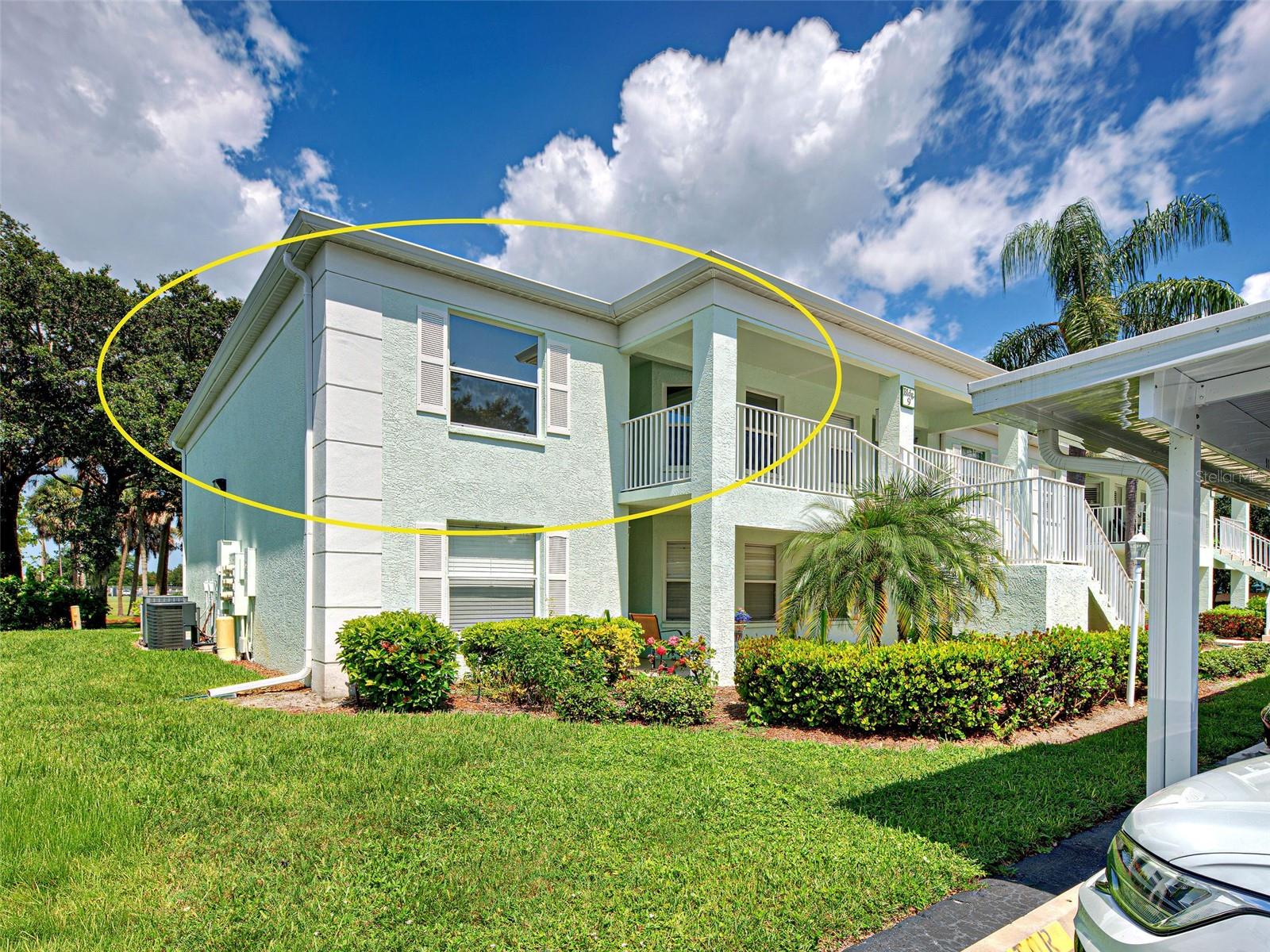 One or more photo(s) has been virtually staged. What a deal, price reduced! Such a great location!
Welcome to this move-in ready condominium in desirable Cocoplum. The HOA fee covers water, sewer, trash, pool, building maintenance, reserves, and more—offering both value and peace of mind. Ideally located with convenient access to shopping and Tamiami Trail, this second-floor end unit combines comfort with accessibility.

The building exterior has been recently repainted, with a new roof installed in 2022, updated modern lighting fixtures, and brand-new carports. Enjoy beautiful eastern sunrises from the front of the building and relax on your private lanai with stunning sunset views.

Inside, you’ll find a spotless and thoughtfully upgraded 2-bedroom, 2-bath split floor plan. The entry features an upgraded Andersen storm door, leading into a spacious living area with vaulted ceilings, fresh paint, and light laminate wood flooring that enhances the natural brightness.

The kitchen offers exceptional storage with two pantry areas—perfect for keeping everything organized—along with a charming breakfast nook to enjoy your morning coffee with sunrise views. The tiled lanai has been enhanced with luxury sunshades and vinyl sliding windows, providing added comfort and flexibility. Both the living room and primary bedroom offer direct access to this relaxing outdoor space. All windows feature protective tinting for added efficiency and comfort.

The primary suite includes a fully remodeled ensuite bathroom with a beautifully tiled walk-in shower and an oversized walk-in closet with additional shelving for extra storage. The primary bedroom comes furnished with a high-quality solid wood Vaughan-Bassett set, including a brand-new, never-used mattress, dresser, headboard, footboard, nightstand, and mirror.

Additional highlights include upgraded ceiling fans throughout, an indoor laundry area with a high-end Maytag washer and dryer, a water heater (2022), A/C system (2019), and roof (2022).

Cocoplum is a welcoming community that allows small pets (under 15 lbs; see rules for details) and does not permit rentals, fostering a true neighborhood feel. Residents enjoy a heated community pool and well-maintained grounds. The HOA fee also includes water and sewer for added convenience.

Located near Cocoplum shopping plaza, Wellen Park, Costco, and just a short drive to some of the area’s best beaches, this condo truly offers the best of Florida living.

Schedule your private tour today and make this beautiful, move-in ready home yours!