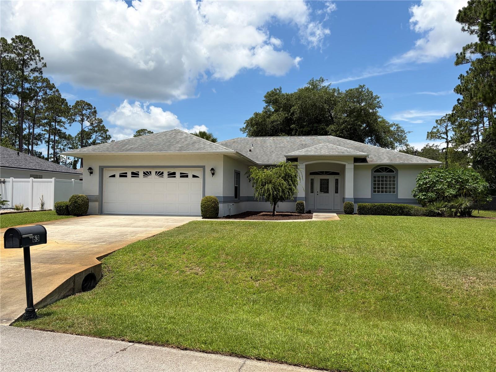 COMING SOON! Welcome to 63 Brushwood Lane in Palm Coast. This 3-bedroom, 2-bath home sits on an oversized 0.34-acre (14,680 sq ft) lot, with a wooded drainage easement nearby that provides extra separation and a more private feel. A standout feature is the all-glass enclosed sunroom/lanai with year-round temperature control, offering flexible additional living space to enjoy in every season.

Convenient access to area amenities including Flagler Beach (approx. 20 miles), Publix at Palm Coast Town Center, Palm Coast Town Center, and AdventHealth Palm Coast Parkway. More details and photos coming soon.

Buyer to verify all measurements, features, and any easements or restrictions.