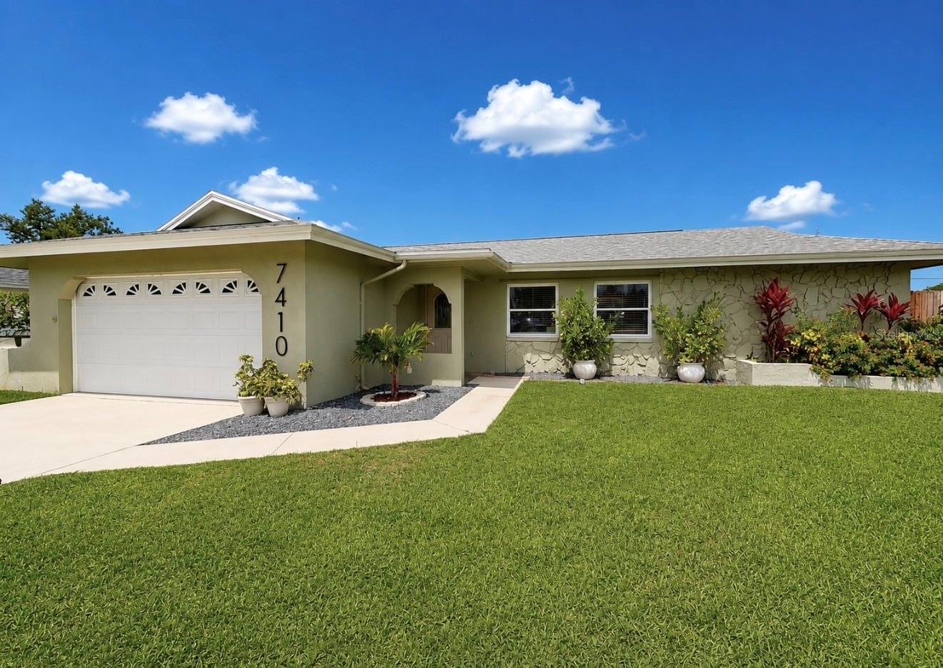 Welcome to 7410 13th Ave W in Bradenton, Florida! Beautifully updated, this 3-bedroom, 2-bath pool home sits on an oversized lot in a convenient location near Holmes Beach, Ana Maria Island, shopping, dining, and everyday amenities. This move-in ready home offers 1,410 square feet of bright, inviting living space with new flooring throughout, fresh exterior paint, and an abundance of natural light.
The updated kitchen features stone countertops, tile backsplash, and ample cabinet space, creating the perfect blend of functionality and modern design. Both bathrooms have been updated and the open living areas flow seamlessly into a spacious Florida room with sliding glass doors leading to the patio and the private backyard oasis. Step outside to enjoy the pool, expansive fenced yard, and plenty of room for entertaining, gardening, pets, or outdoor activities. Major updates include a new roof in 2025, providing added peace of mind for years to come. Whether you're searching for a primary residence, seasonal Florida retreat, or investment opportunity, this Bradenton pool home offers the perfect combination of indoor comfort, outdoor living, and a prime location just minutes from the area's renowned beaches and attractions. Schedule your showing today!