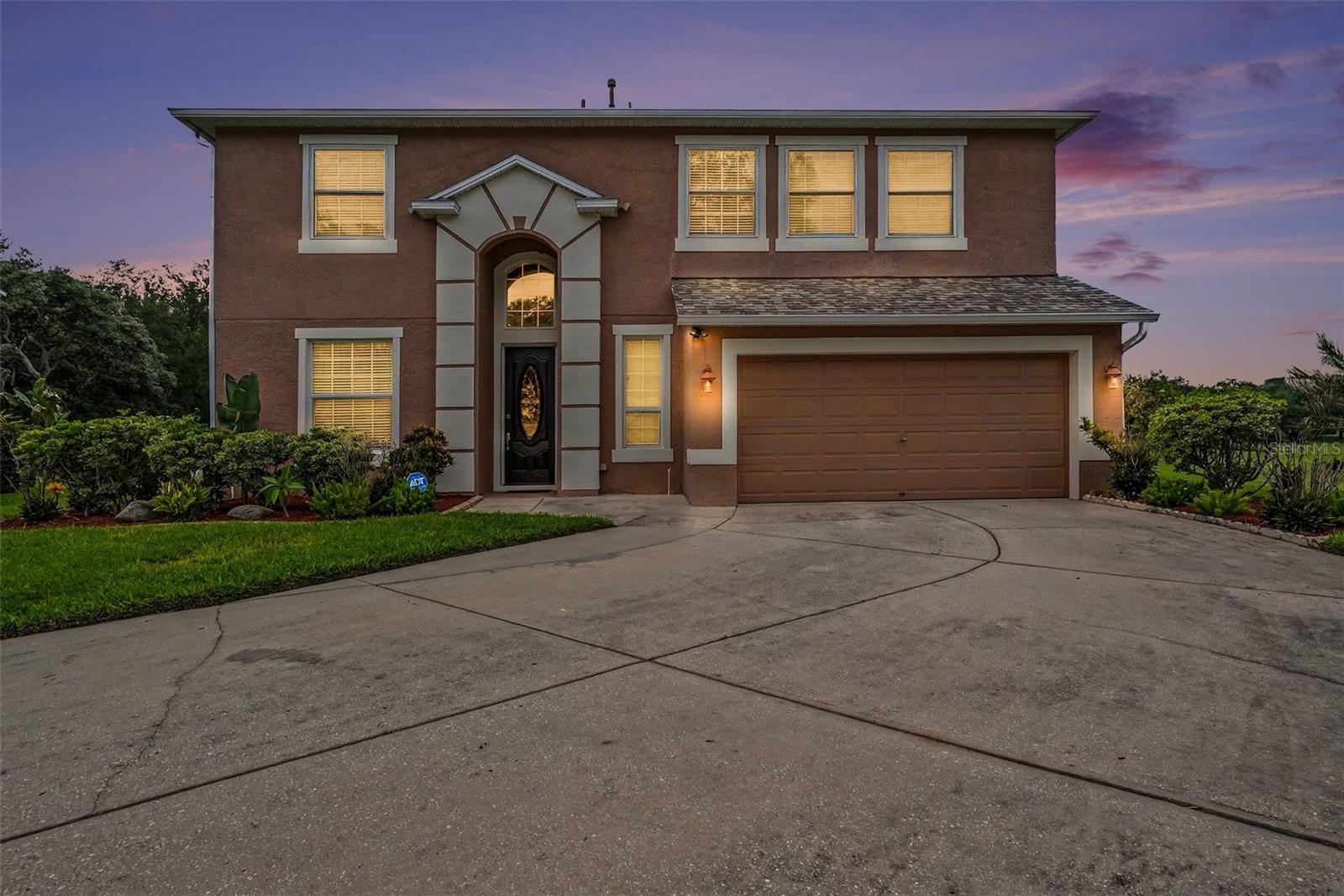 Please contact Nirali Patel at 408-394-5948 or Rejash Patel at 727-771-3228. Beautifully located on a cal-de-sac with both a conservation and water view. This home features 5 bedrooms, 3 1/2 bath, and bonus room in over 3,500 square feet. in addition to all the formal rooms, you will find an intercom system, title in all wet areas, inside utility and eat-in kitchen. Kitchen has lots of storage space with 42-inch cabinets, pantry and closet under the stairwell. There is accent lighting above the cabinets to show off your collectibles, and instant-hot water for the chef. Master suite is located downstairs with large walk-in-closet, dual sinks, garden tub and separate shower. Other rooms are large and one will make an excellent in- law or guest suite. Pre-wired for a pool; family room or bonus rooms are wired for surround sound. 2AC units, reclaim water, tinted windows and R30 insulation to help with utility bills. All of this tucked away in a gated community and located just minutes away from the crosstown Expressway, I-75 and Brandon Town Centre.