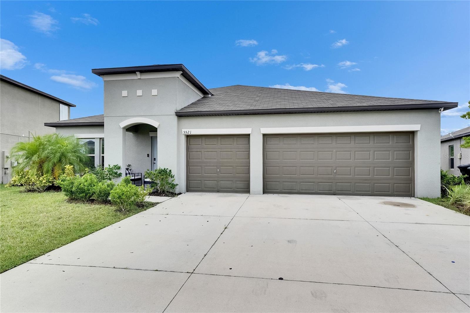 Short Sale. 4-bedroom, 2-bathroom home with a 3-car garage, situated in the highly sought-after Trevesta community in Palmetto, Florida. This residence boasts an open-concept floor plan, perfect for modern living and entertaining. The spacious master suite is thoughtfully located on the opposite side of the home, offering privacy and tranquility. The well-appointed kitchen features a large center island, ideal for meal preparation and casual dining. The home is complemented by a fenced-in backyard, providing a secure space for relaxation and outdoor activities. Residents of Trevesta enjoy access to exceptional amenities, including a resort-style zero-entry pool with cabanas, a splash pad, a 5,600 sq ft clubhouse, a 24-hour fitness center, scenic walking trails, and a dedicated lifestyle director who organizes community events and activities. This home offers a harmonious blend of comfort, convenience, and community, making it an ideal choice for those seeking a vibrant and active lifestyle.