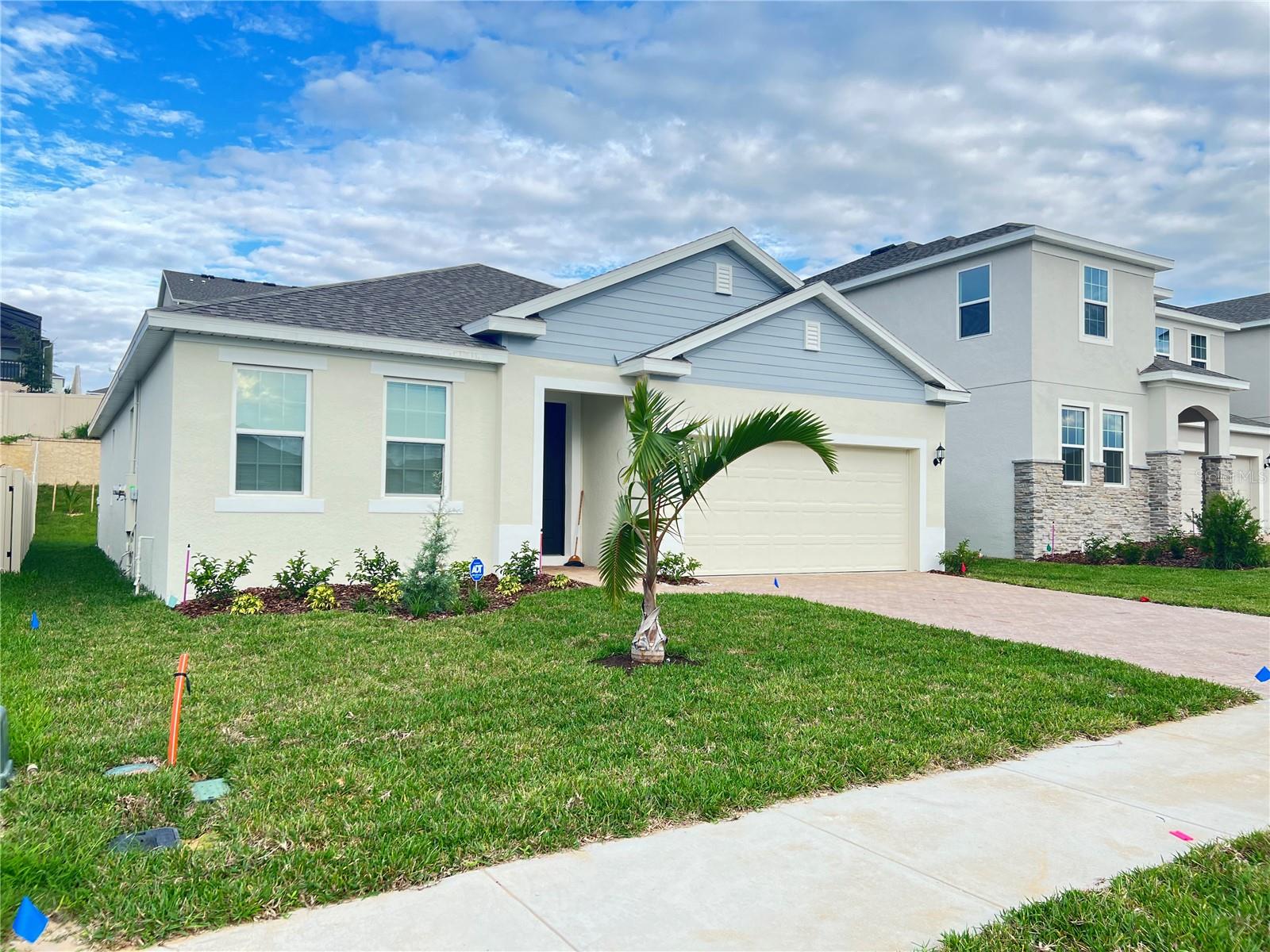 DON'T MISS THIS FANTASTIC RENTAL OPPORTUNITY! BRAND NEW 4 bedroom, 2 bath, 2 car garage house in Minneola area. Features include an upgraded kitchen with an island, stone countertop and stainless steel appliances, ceramic tiles in all wet areas, dining and family room, and carpet in all bedrooms. The master bath has a beautiful walk-in shower with a glass door, dual sink, and a water closet. Centrally located CLOSE to highway, shopping and schools. Rent payment includes washer, dryer and ADT security system monitoring. Schedule you viewing today!
