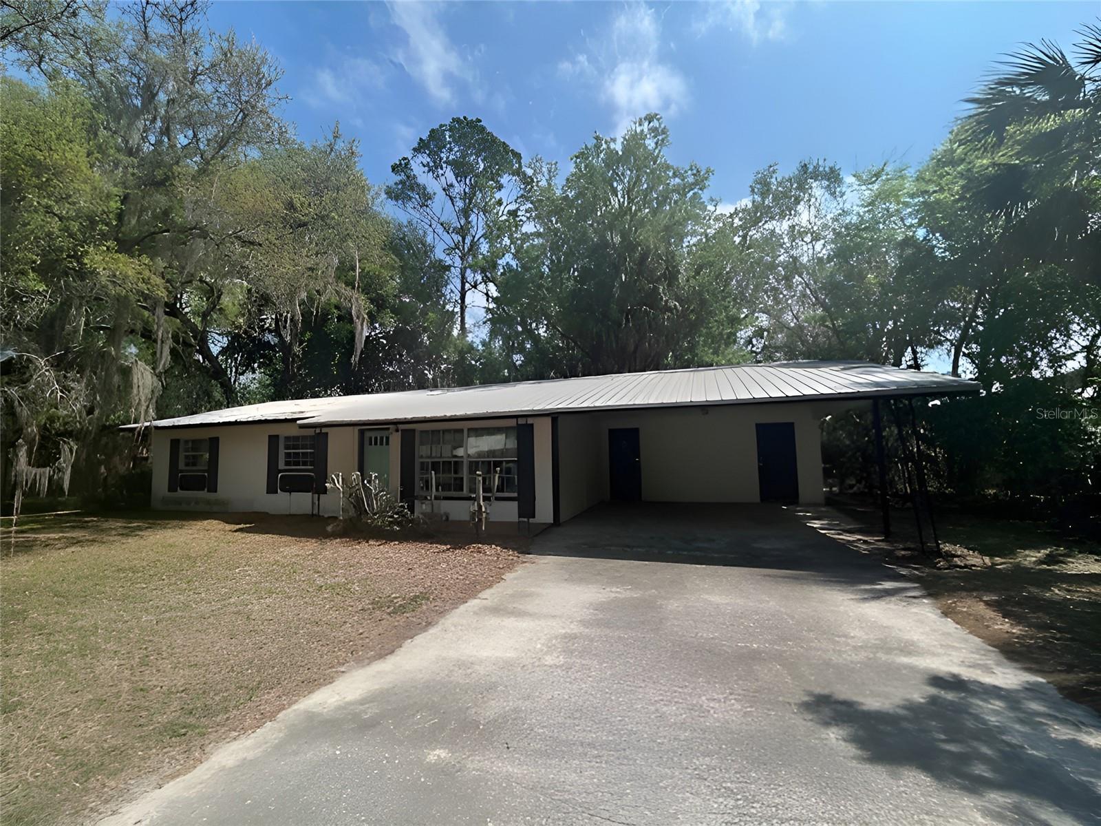 Located within walking distance of the heart of downtown Chiefland, schools and businesses this cute 3 bedroom 2 bath home concrete block construction with a metal roof is waiting to be all yours.