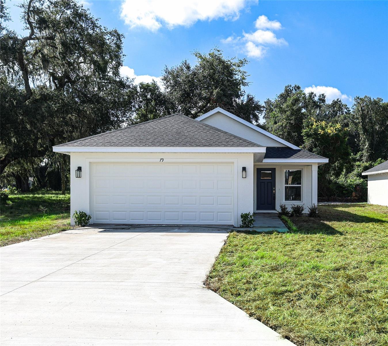 Welcome! Sitting in the heart of Central Florida, this brand-new home is in the charming town of Webster and is waiting for you! This cozy home boasts 3 bedrooms, 2 bathrooms and attached 2 car garage.  The kitchen claims beautiful cabinets and is equipped with STAINLESS STEEL appliances, GRANITE COUNTERTOPS, MOEN PLUMBING FIXTURES, CERAMIC TILE THROUGHOUT THE MAIN LIVING AREAS. The kitchen boasts ample kitchen cabinet space, making meal prep a breeze. The master bedroom includes an ensuite bathroom offering a peaceful retreat from the rest of the home. The other two bedrooms share a spacious bathroom with granite countertop. The open concept living area is designed with both entertaining and relaxation in mind. The living room flows seamlessly into the kitchen and dining area, creating a perfect space for family gatherings or hosting guests. This home is conveniently located near shopping, dining, and entertainment options. Overall, this new construction home offers a perfect combination of comfort and convenience in a sought-after location in Central Florida. Make your appointment today!