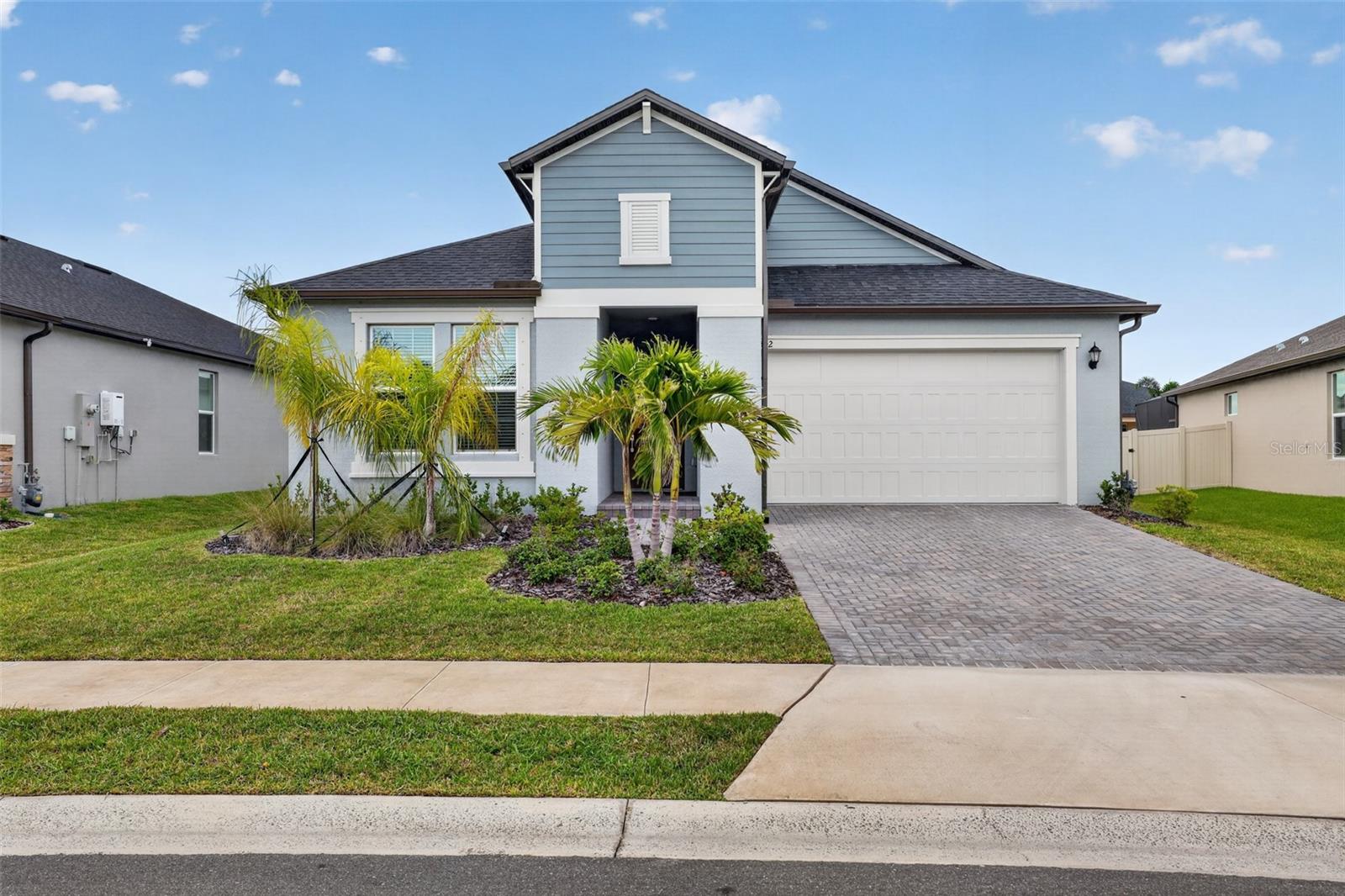 MOVE IN READY! Welcome to 7542 117th Lane E in Stonegate Preserve community of Palmetto! Built in 2025, this move-in-ready 3-bedroom, 2-bath 1,846 sq ft home / 2 car garage offers modern living with an open-concept floor plan, abundant natural light, and stylish finishes throughout. The spacious kitchen flows seamlessly into the living and dining areas, creating the perfect space for entertaining family and friends. The private suite features a large closet and en-suite bath, while the additional bedrooms provide flexibility for guests, family, or a home office. Step outside to one of the home's standout features - a large backyard with plenty of room for outdoor gatherings, gardening, or creating your dream outdoor living space. As a resident of Stonegate Preserve, you'll enjoy resort-style amenities including a community pool, clubhouse, fitness center, pickleball courts, dog park, and playground. The community is conveniently located near shopping, dining, beaches, and major commuter routes, offering the perfect combination of comfort, convenience, and Florida living. Schedule today and experience everything Stonegate Preserve has to offer!