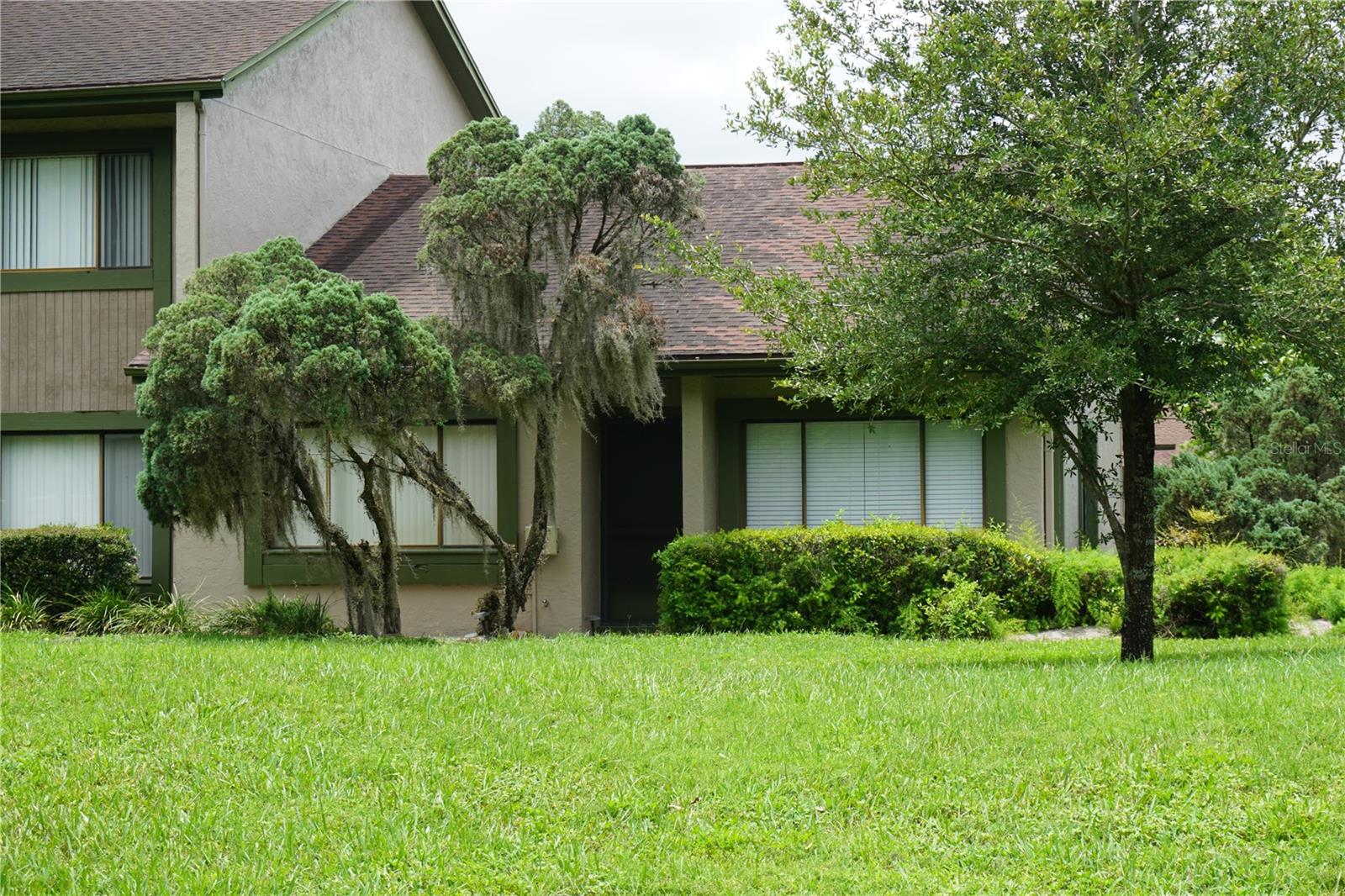***EXCELLENT OPPORTUNITY***Looking for a 2-bedroom, 2 full bathroom condo to live in or for an investment property? This is for you!  This single-story unit offers 2 bedrooms, 2 full bathrooms, luxury vinyl plank and tile flooring throughout. Enjoy your separate fenced courtyard and screened in patio. You will LOVE walking among the mature landscaping and large oak trees. Residents have access to three community pools, and tennis courts. The HOA includes exterior maintenance, roof, sewer, trash and water for a maintenance free living. Conveniently located just minutes from USF, Florida College, Lettuce Lake Park, Moffitt Cancer Center, Busch Gardens, shopping, I-75, I-4, and Downtown Tampa.