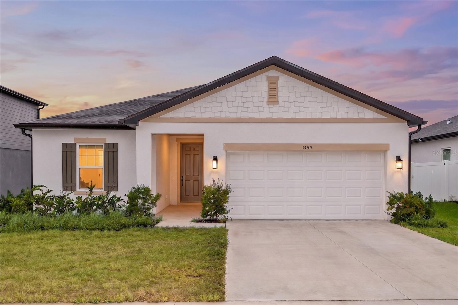 Short Sale. Nearly New Ashton Woods Home in Hampton Oaks. Welcome to Hampton Oaks, one of Deltona's newest communities! Built by Ashton Woods in 2024, this beautifully designed Badland floor plan offers 4 bedrooms, 2 bathrooms, and 1,903 square feet of thoughtfully designed living space. Step inside and you'll immediately appreciate the bright, open-concept layout featuring a spacious kitchen overlooking the dining and living areas—perfect for entertaining or simply enjoying everyday life. The kitchen is beautifully appointed with 42-inch white cabinetry, quartz countertops, a large center island with a single-basin sink, stainless steel appliances, and designer lighting. The private owner's suite offers a spacious walk-in closet and an upgraded ensuite bath featuring a frameless heavy-glass walk-in shower enclosure, creating a luxurious retreat at the end of the day. Additional features include ceramic tile flooring throughout the main living areas, blinds, an indoor laundry room, a covered lanai, irrigation system, rain gutters, and a two-car garage. Hampton Oaks offers sidewalks, a neighborhood playground, and an excellent location just minutes from I-4, shopping, restaurants, medical facilities, and an easy commute to Orlando, Lake Mary, and the beaches. Short Sale: This property is being offered as a short sale. Seller has not yet obtained lender approval. All offers are subject to third-party lender approval, but this is an outstanding opportunity to own a nearly new Ashton Woods home in one of Deltona's most desirable newer communities. Schedule your private showing today!