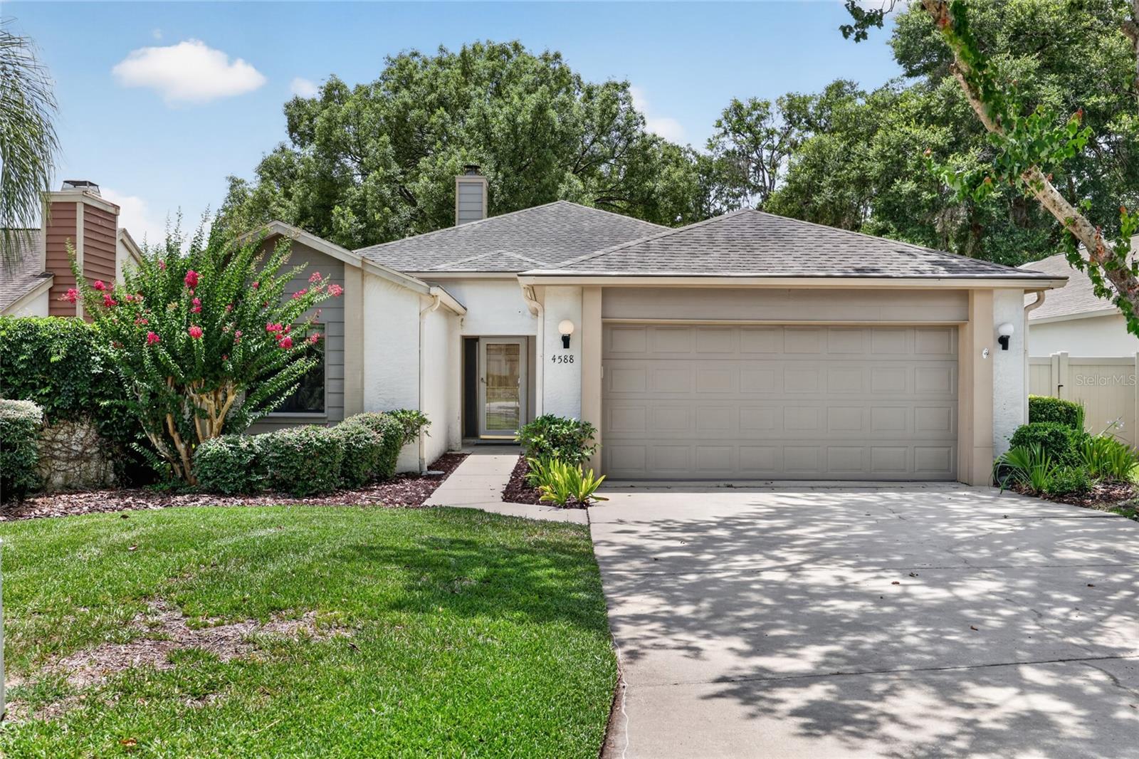 Located in the highly desirable Stonewood Villas community, this spacious 2-bedroom, 2-bath home also features a private office/den with a closet that could easily serve as a third bedroom. The open floor plan is filled with natural light, creating an inviting space that's perfect for both everyday living and entertaining. The kitchen features quartz countertops, abundant cabinetry, a breakfast bar, all appliances, and opens seamlessly to the great room and dining area. The great room offers a cozy gas fireplace, custom built in cabinetry, decorative crown molding with accent lighting, and plenty of space to gather with family and friends. The spacious primary suite offers walk in closets, and large bathroom with dual vanities, a jetted soaking tub, separate walk-in shower, and private water closet. A tankless water heater ensures you'll never run out of hot water. For valuable peace of mind, your whole house Generac Generator is on standby. Additional highlights include an indoor laundry room with washer and dryer, oversized two-car garage with ample storage, mature landscaping, and a low maintenance lot. Stonewood Villas is a quiet, well-established, all-age community with low HOA fees and a convenient location just minutes from shopping, restaurants, medical facilities, and downtown Ocala. If you're looking for a spacious home in one of Ocala's most desirable neighborhoods, this is one you won't want to miss.