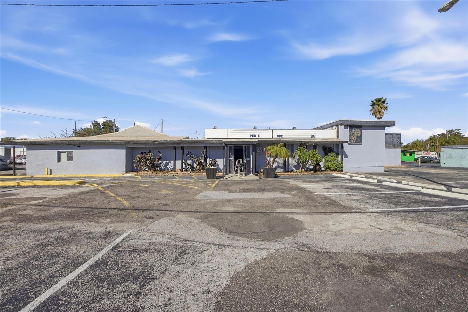 Just south of the high-traffic intersection of Park Boulevard and 66th Street sits a rare commercial opportunity in the heart of Pinellas County. Spanning over one-third of an acre with C-2 zoning, this highly visible property is primed for entrepreneurs, restaurateurs, and creatives ready to make a bold move.

With full frontage on 66th Street and exposure to over 50,000 vehicles daily, your business gains instant visibility and constant traffic. The property features two existing, fully functional buildings, one equipped with a drive-up window, offering immediate operational potential or a clean slate for redevelopment.

Inside, the space pulses with character and creative possibility. The current owners have left behind two full-service bars, a walk-in cooler, two dance floors, a large main stage, and DJ booths - ideal for entertainment, nightlife, or hospitality concepts. Retain the existing infrastructure or reimagine the site entirely; the flexibility here is unmatched.

This premier location is 16 minutes from downtown St. Petersburg, 12 minutes from St. Pete Beach, and just 35 minutes from SoHo and Ybor City Tampa, placing it squarely within one of the region's most dynamic commercial corridors.

With 40+ parking spaces, a drive-through front entrance, and endless development possibilities, this property delivers high traffic, high energy, and high potential - a true gem ready for its next vision. Just south of the well-traveled intersection of Park Boulevard and 66th Street North lies an exceptional commercial opportunity in the heart of Pinellas County. Spanning over one-third of an acre and zoned C-2, this high-visibility property offers the perfect foundation to launch your business venture or bring a creative concept to life.

With direct frontage on 66th Street, your business will benefit from outstanding exposure - over 50,000 vehicles pass by daily. The property includes two operational buildings, one featuring a convenient drive-up window. Currently outfitted as an entertainment venue, the space includes two full-service bars, a walk-in cooler, two dance floors, and a spacious main stage with DJ booths. Continue the existing concept, adapt the layout to suit your needs, or reimagine the site entirely - the flexibility is yours.