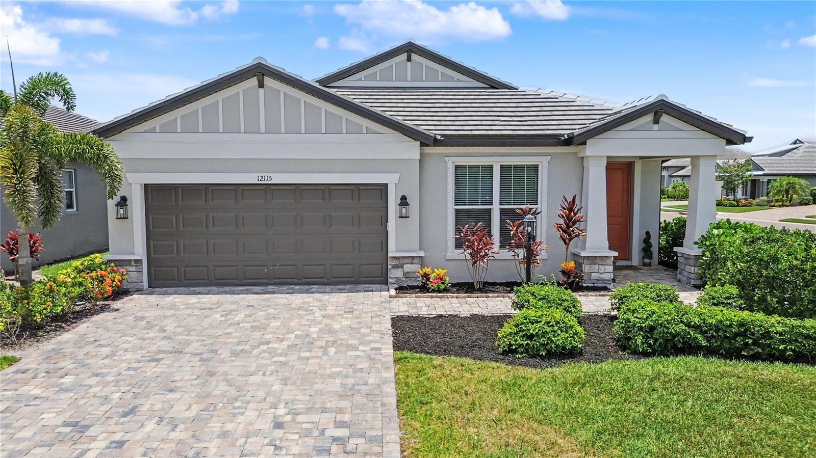 Welcome to this nearly new four-bedroom, two-bathroom home offering 2,136 square feet of thoughtfully designed living space on a large corner lot in Cypress Glen, a gated neighborhood within River Wilderness.

Built by M/I Homes in 2024, the residence combines modern finishes with an open, functional floor plan. A paver driveway, tile roof and rain gutters enhance the exterior, while plank-style ceramic tile flooring flows through the main living areas. The open-concept kitchen, dining area and great room create an inviting central gathering space, complemented by a tray ceiling and abundant natural light.

The kitchen features matching quartz countertops, solid wood cabinetry, stainless steel appliances, generous workspace and a large island overlooking the living and dining areas. Coordinating quartz surfaces and cabinetry continue into the bathrooms for a cohesive, contemporary design. The split-bedroom layout provides added privacy, with the primary suite positioned separately from the three additional bedrooms—ideal for family, guests or a home office.

River Wilderness offers an optional golf and country club lifestyle, with available amenities including a clubhouse, fitness center, community pool, tennis courts and a private boat ramp for a small monthly fee. Convenient access to Fort Hamer Road provides a direct route through Lakewood Ranch, while nearby shopping, dining and retail centers make everyday errands easy. I-75 is less than 15 minutes away, offering convenient travel throughout the Sarasota-Bradenton area.

Enjoy the benefits of a newer home, a spacious corner homesite and an amenity-rich gated community—all in a convenient Manatee County location.