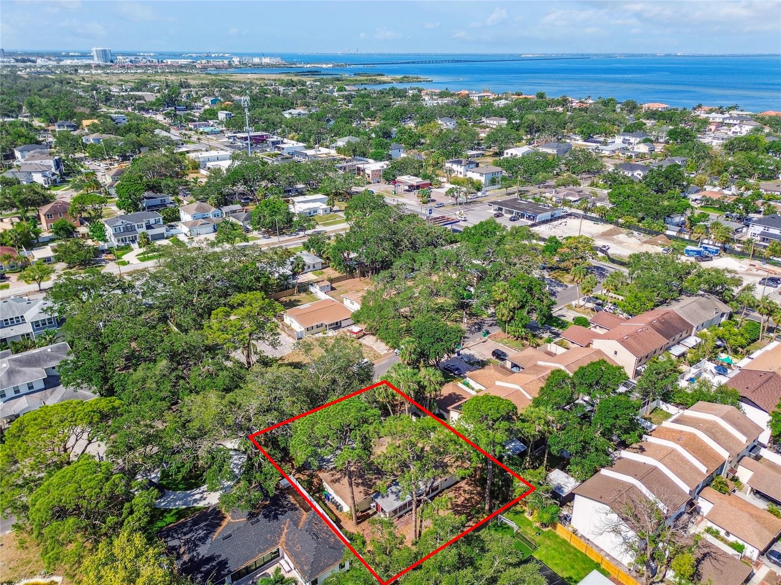Bel Mar Revised property with incredible potential for those looking to build or restore in one of Tampa’s most coveted areas. A prime opportunity to create your dream home, this large 8,800 sq. ft. lot, 80x110 and zoned RS-75. Large trees positioned perfectly to allow maximum use of the lot or possible renovate existing home. Home has never had any water intrusion over the last 40+ years that owner has owned the house. Water damage from Hurricane Helene consisted of approximately 13 inches of water in parts of the house. The 3/2 home with 1908 Sq. Ft. living space, and 2288 Sq.Ft. under roof was built in 1953 and was well maintained over the years. Constructed of concrete block with plaster walls, and solid foundation also features a large Florida room, garage and large backyard. Property is being sold as a lot with house in “As Is Condition”.