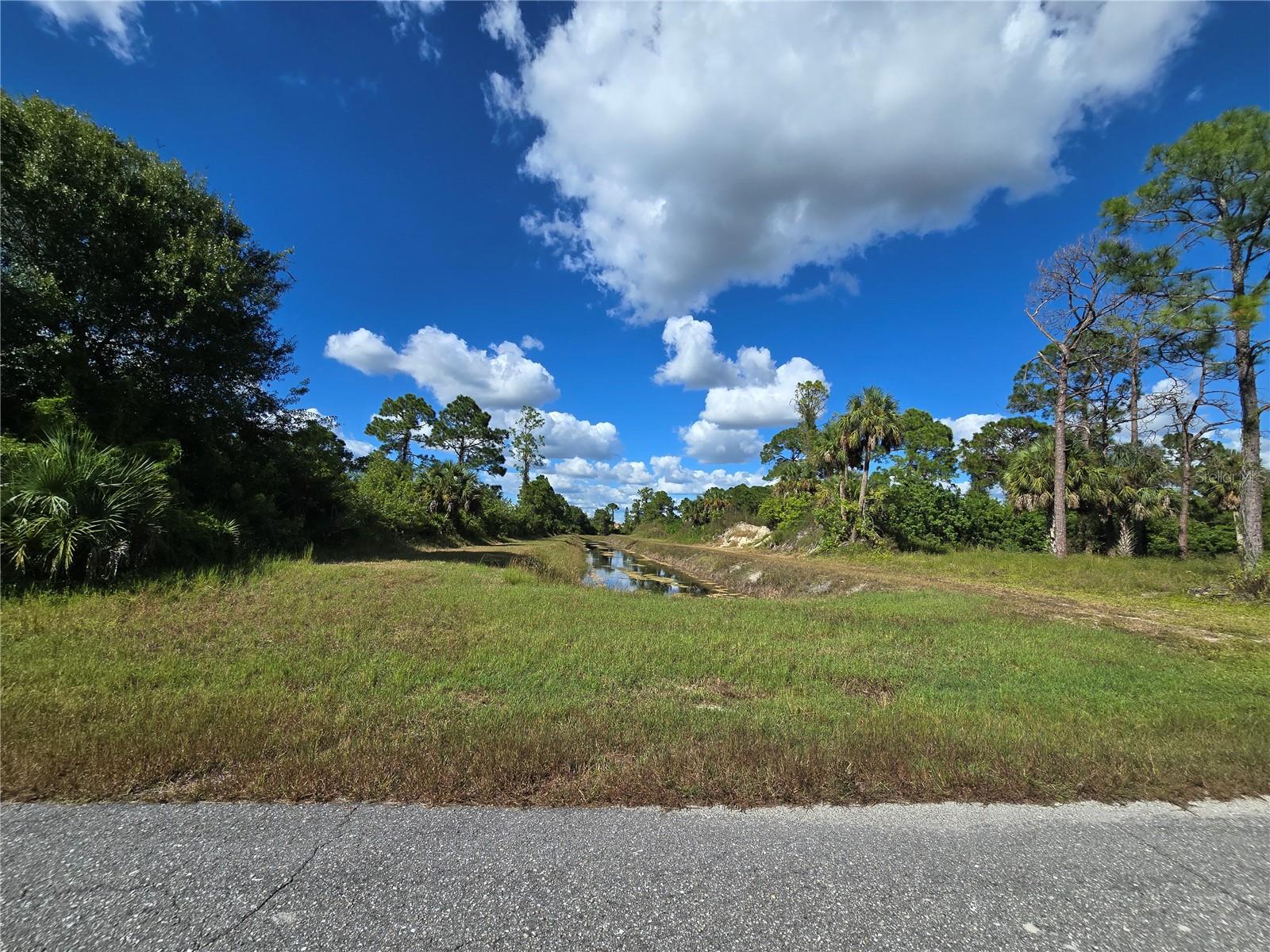 Prime vacant lots available in Lehigh Acres—an exceptional opportunity to purchase FOUR side-by-side parcels, perfect for builders aiming to streamline construction or for end users seeking extra space, enhanced privacy, and the advantage of avoiding future neighbors. Whether you plan to build one home, two homes, three homes or a mansion, this is your chance to bring your dream vision to life in one of the fastest-growing and most desirable communities in Southwest Florida. Each lot is situated in a peaceful neighborhood surrounded by well-maintained, established homes, which immediately adds value to any future construction. The area is thriving, with paved roads, nearby utility access, and a strong sense of community development, making it an attractive choice for investment or personal use. This location is ideal for those looking to build a custom home in a quiet, established area just minutes from schools, shopping centers, dining options, and recreational parks—an excellent setting for both families and professionals. With convenient access to State Road 82 and I-75, commuting to Fort Myers is easy and efficient. Plus, it’s less than a 30-minute drive to Southwest Florida International Airport. Whether you're looking to expand your backyard, build multiple homes, or secure additional land for long-term investment, this is a smart and strategic move. Build now or hold for the future—these Lehigh Acres lots are ready for your vision. Contact me today for more information.
