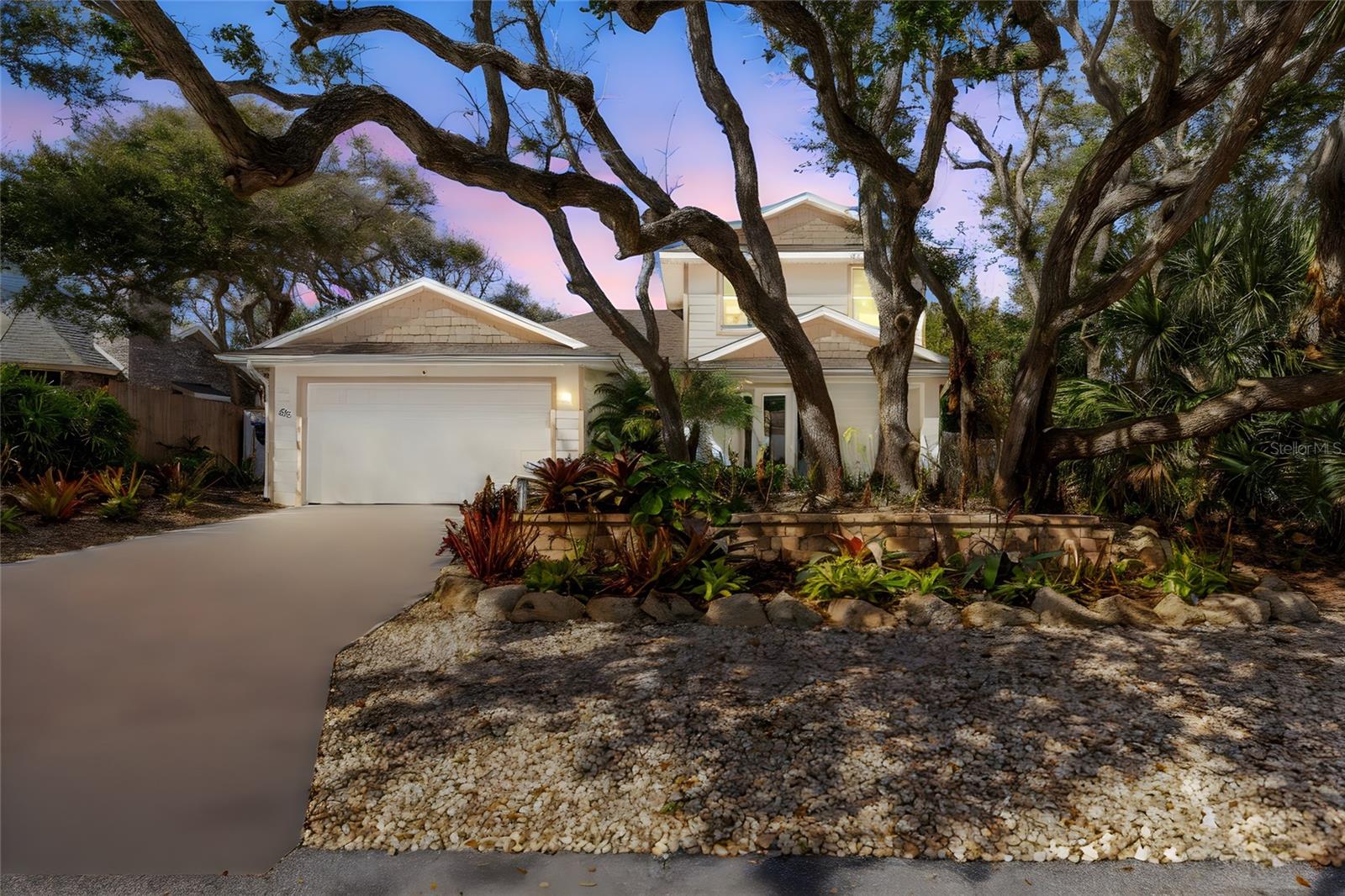 Experience the coastal lifestyle you've always imagined in this three-year-old, 3-bedroom, 2.5-bath luxury pool home in beautiful Ponce Inlet. Ideally positioned on an exceptional lot enhanced by over $30,000 in lush tropical landscaping, this home is located just six homes from direct access to Ponce Inlet's semi-private, no-drive beach. Thoughtfully designed for the most discerning buyers, it offers the perfect blend of comfort, style, and coastal living. Inside, 68 Glenview features a well-designed, inviting floor plan. The first floor features a spacious primary suite along with the kitchen, living room, and dining areas, as well as a laundry room and half bath, creating an open and welcoming layout ideal for everyday living and entertaining. The kitchen is beautifully appointed with white cabinetry, stainless steel appliances, quartz countertops, and a pantry. Luxury vinyl flooring runs throughout the home, adding both durability and elegance.
Upstairs, you'll find two additional bedrooms, a full bathroom, and a versatile family or flex room perfect as a second living area, game room, or media space. Designed for seamless indoor-outdoor living, the home offers a spacious covered front porch and back porch, a stunning pool featuring a UV filtration system, a waterfall, a Pebble Tec finish, and expansive paver decking. Surrounded by lush tropical landscaping, the outdoor space creates a private, resort-like setting ideal for relaxing or entertaining. The property also features durable Shark Coating on the driveway, walkway, garage floor, and both the front and back porches. This exceptional home is conveniently located near waterfront restaurants, a boat ramp, the dog park, a fishing jetty, a lighthouse, and the Marine Science Center. Don't miss this rare opportunity to own a home that perfectly combines luxury, serenity, and convenience in one of Ponce Inlet's most desirable locations.
