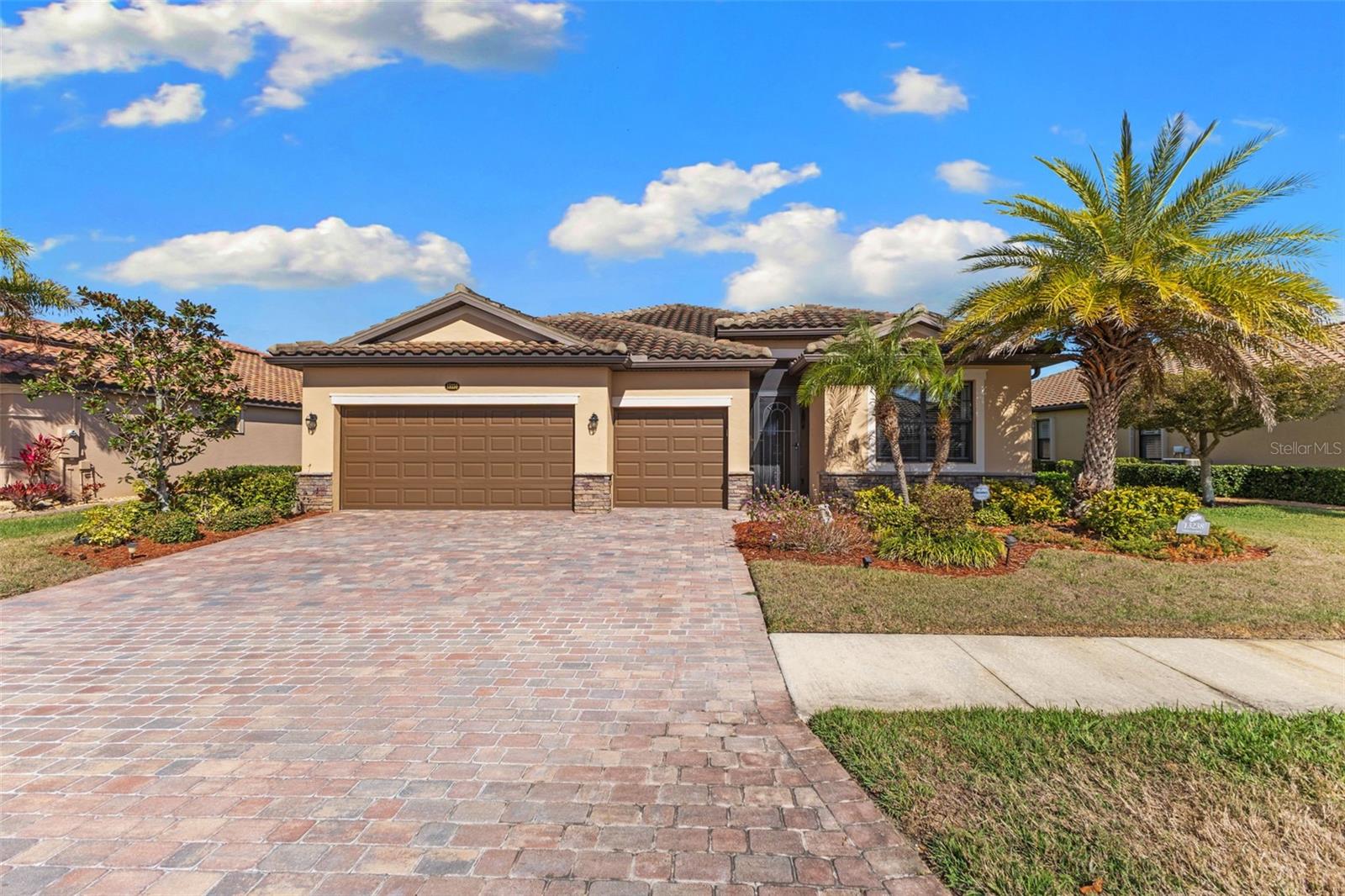 Welcome to 13238 Famiglia Dr, an elegant 4-bedroom, 3-bathroom residence offering 2,254 square feet of refined living within the gates of Gran Paradiso, one of Venice’s premier resort-style communities.

Thoughtfully designed with both comfort and sophistication in mind, this home showcases a seamless open-concept layout filled with natural light and elevated finishes. The expansive living and dining spaces flow effortlessly into a well-appointed kitchen, creating the perfect setting for intimate evenings or upscale entertaining.

The split floor plan offers a true sense of privacy, with a spacious primary suite that serves as a serene retreat, complete with a luxurious ensuite bath and generous walk-in closet. Three additional bedrooms and two full baths provide flexibility for guests, family, or a private office space.

Step outside to your oversized screened and enclosed lanai, a private oasis featuring a jacuzzi, designed for year-round relaxation. Whether enjoying peaceful mornings or sunset evenings, this outdoor living space embodies the essence of Florida luxury.

As a resident of Gran Paradiso, you’ll enjoy world-class amenities including a grand clubhouse, resort-style pool, state of the art fitness center, tennis courts, and impeccably maintained grounds, all just minutes from Gulf Coast beaches, fine dining, and the charm of historic downtown Venice.

13238 Famiglia Dr is more than a home, it’s a lifestyle defined by elegance, comfort, and resort-inspired living.
